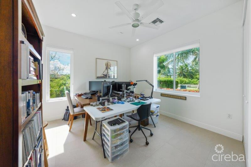 UNIQUE PATRICK’S ISLAND CANAL FRONT HOME W GUEST HOUSE AND 3 CAR GARAGE – SOON TO BE GATED!
