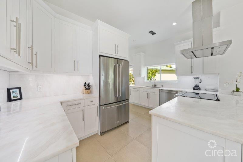 UNIQUE PATRICK’S ISLAND CANAL FRONT HOME W GUEST HOUSE AND 3 CAR GARAGE – SOON TO BE GATED!