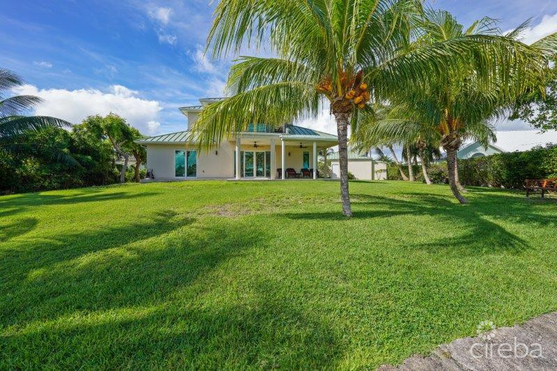UNIQUE PATRICK’S ISLAND CANAL FRONT HOME W GUEST HOUSE AND 3 CAR GARAGE – SOON TO BE GATED!