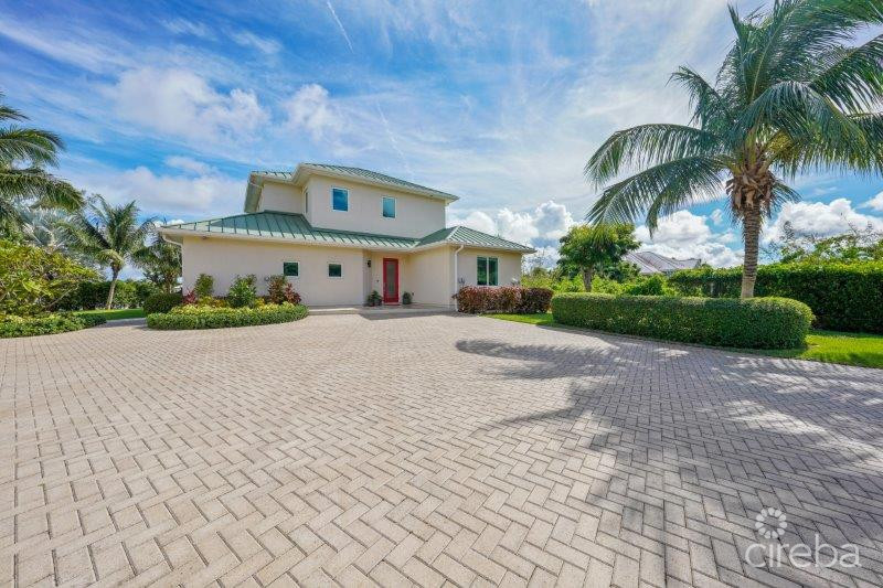 UNIQUE PATRICK’S ISLAND CANAL FRONT HOME W GUEST HOUSE AND 3 CAR GARAGE – SOON TO BE GATED!