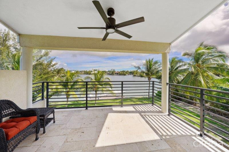 UNIQUE PATRICK’S ISLAND CANAL FRONT HOME W GUEST HOUSE AND 3 CAR GARAGE – SOON TO BE GATED!