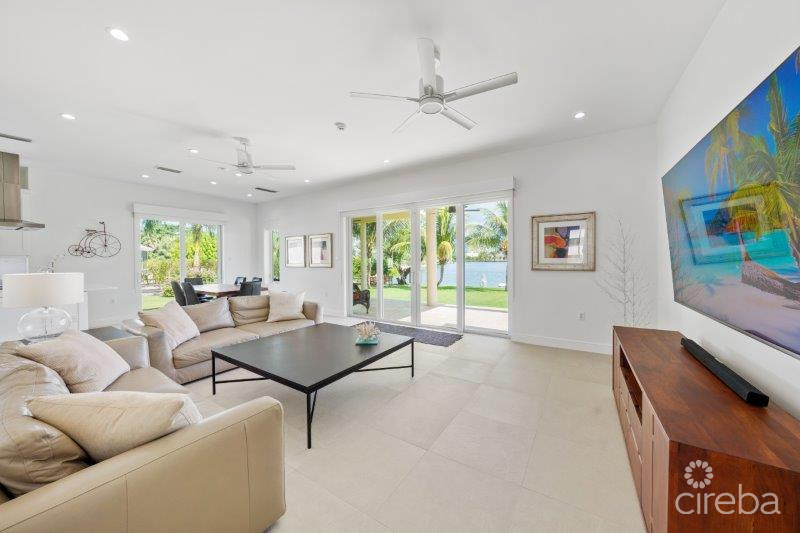 UNIQUE PATRICK’S ISLAND CANAL FRONT HOME W GUEST HOUSE AND 3 CAR GARAGE – SOON TO BE GATED!