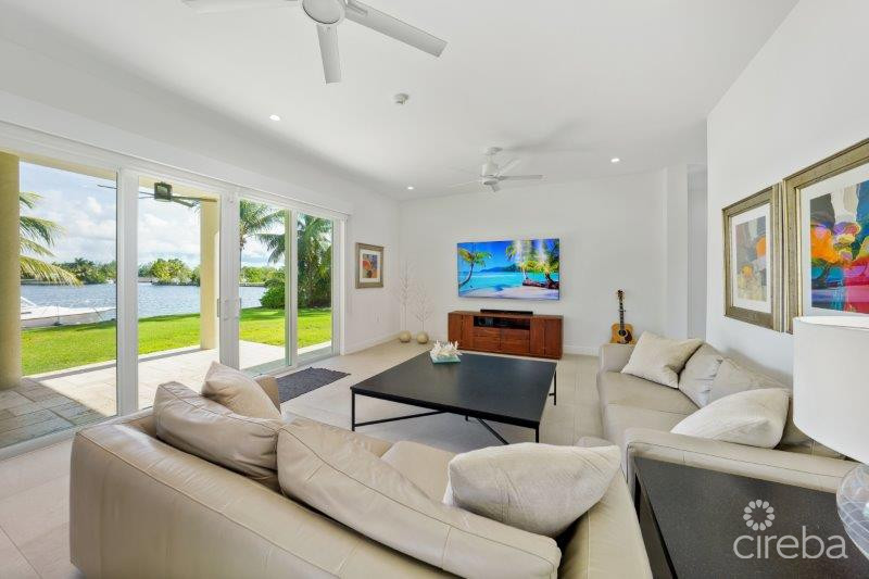 UNIQUE PATRICK’S ISLAND CANAL FRONT HOME W GUEST HOUSE AND 3 CAR GARAGE – SOON TO BE GATED!