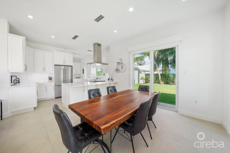 UNIQUE PATRICK’S ISLAND CANAL FRONT HOME W GUEST HOUSE AND 3 CAR GARAGE – SOON TO BE GATED!