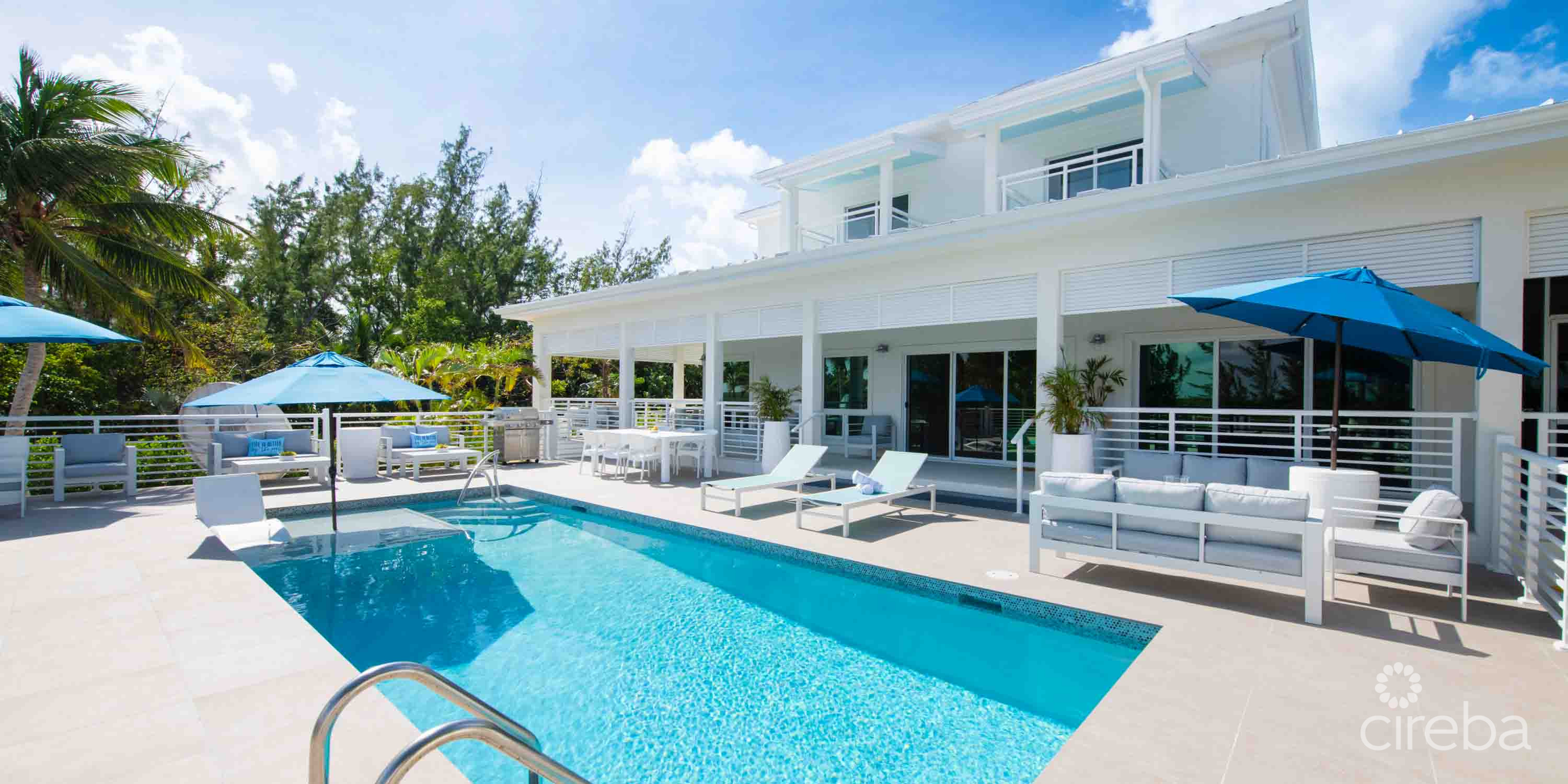 CARIB SUN – EXQUISITE WATERFRONT ESTATE W /GUESTHOUSE IN CAYMAN KAI