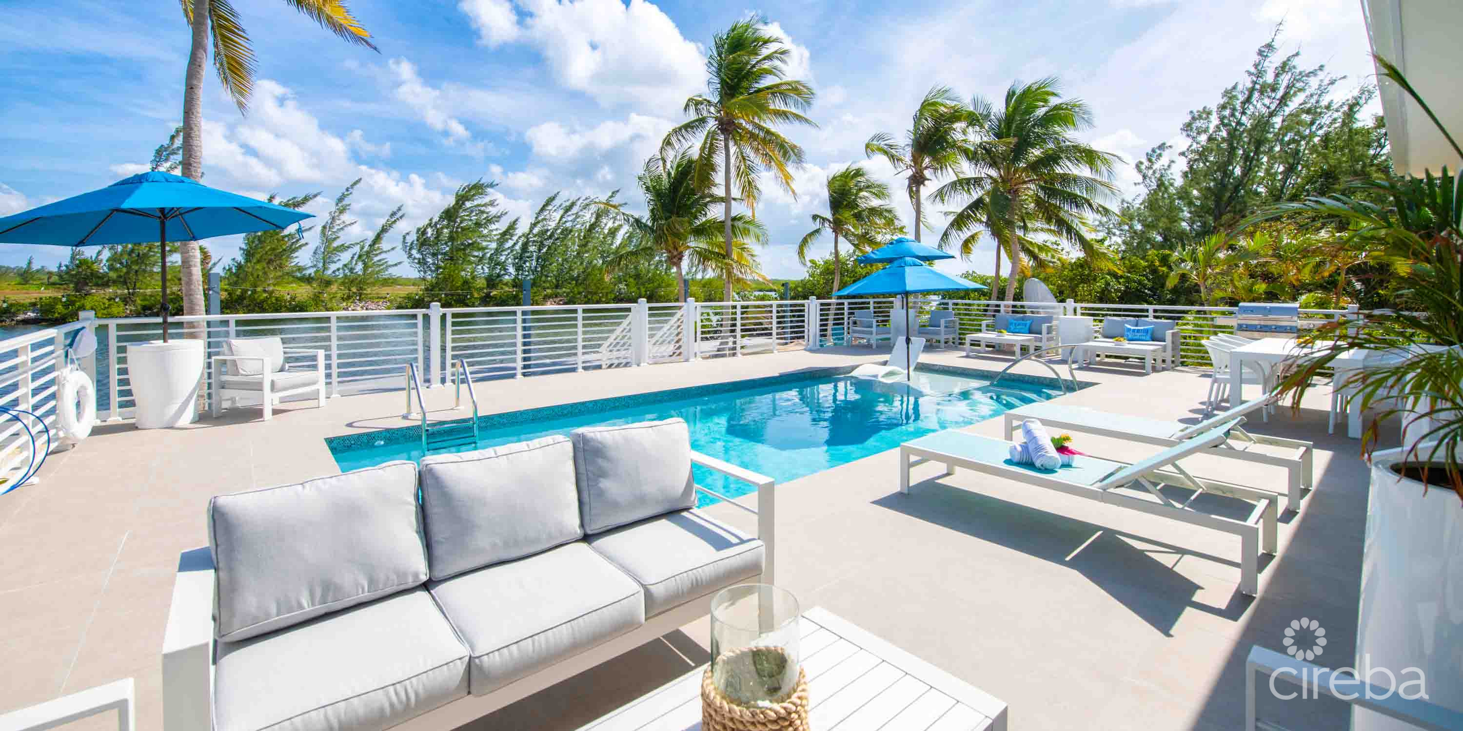 CARIB SUN – EXQUISITE WATERFRONT ESTATE W /GUESTHOUSE IN CAYMAN KAI