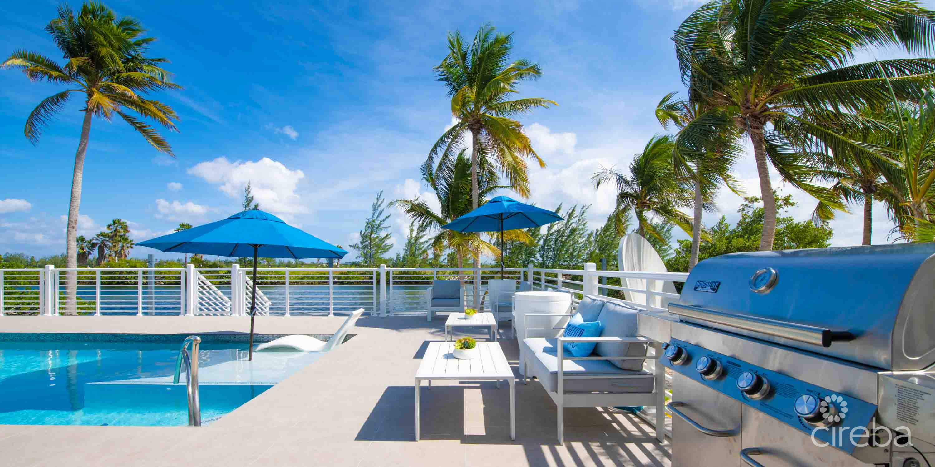 CARIB SUN – EXQUISITE WATERFRONT ESTATE W /GUESTHOUSE IN CAYMAN KAI