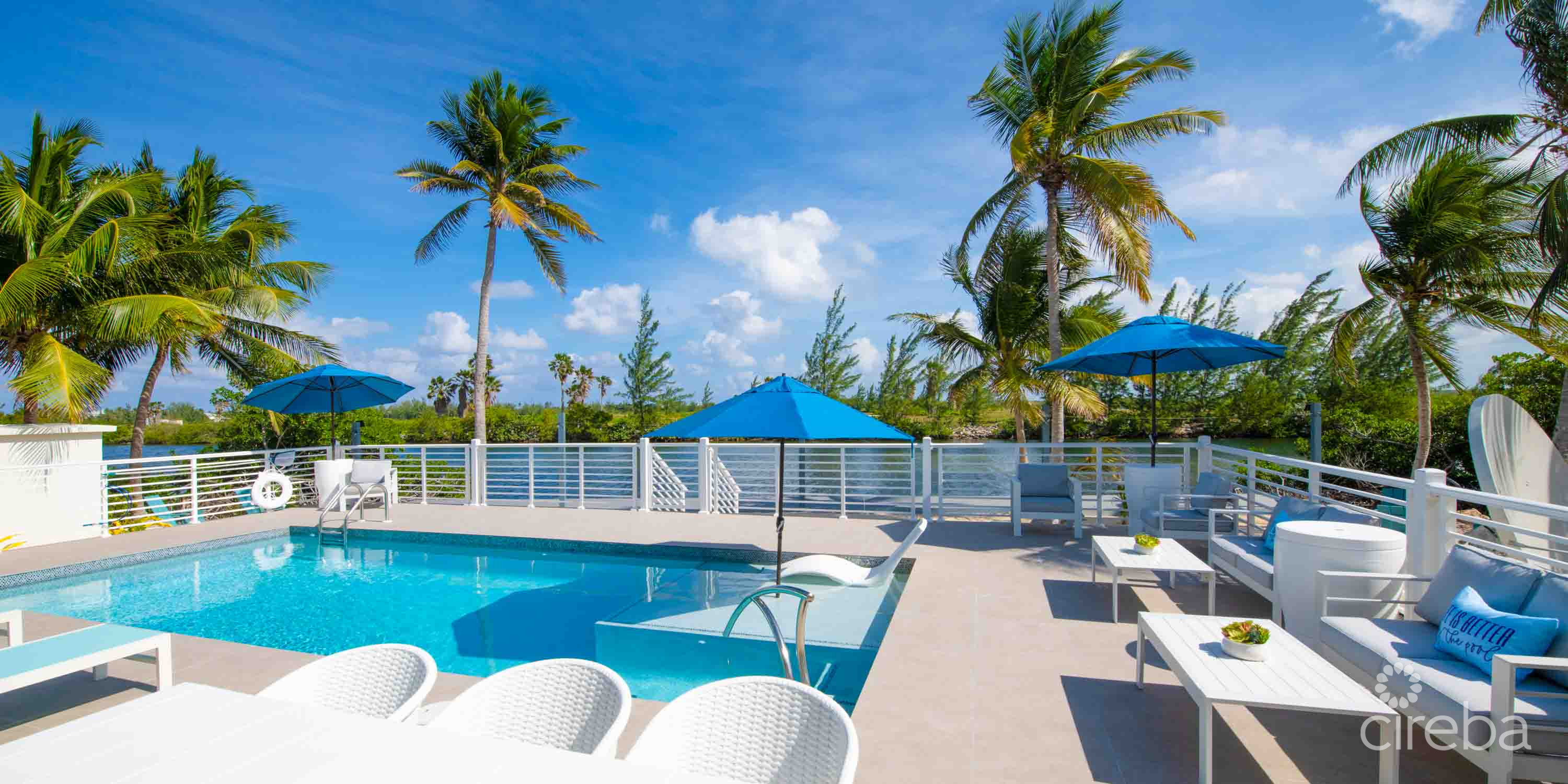CARIB SUN – EXQUISITE WATERFRONT ESTATE W /GUESTHOUSE IN CAYMAN KAI