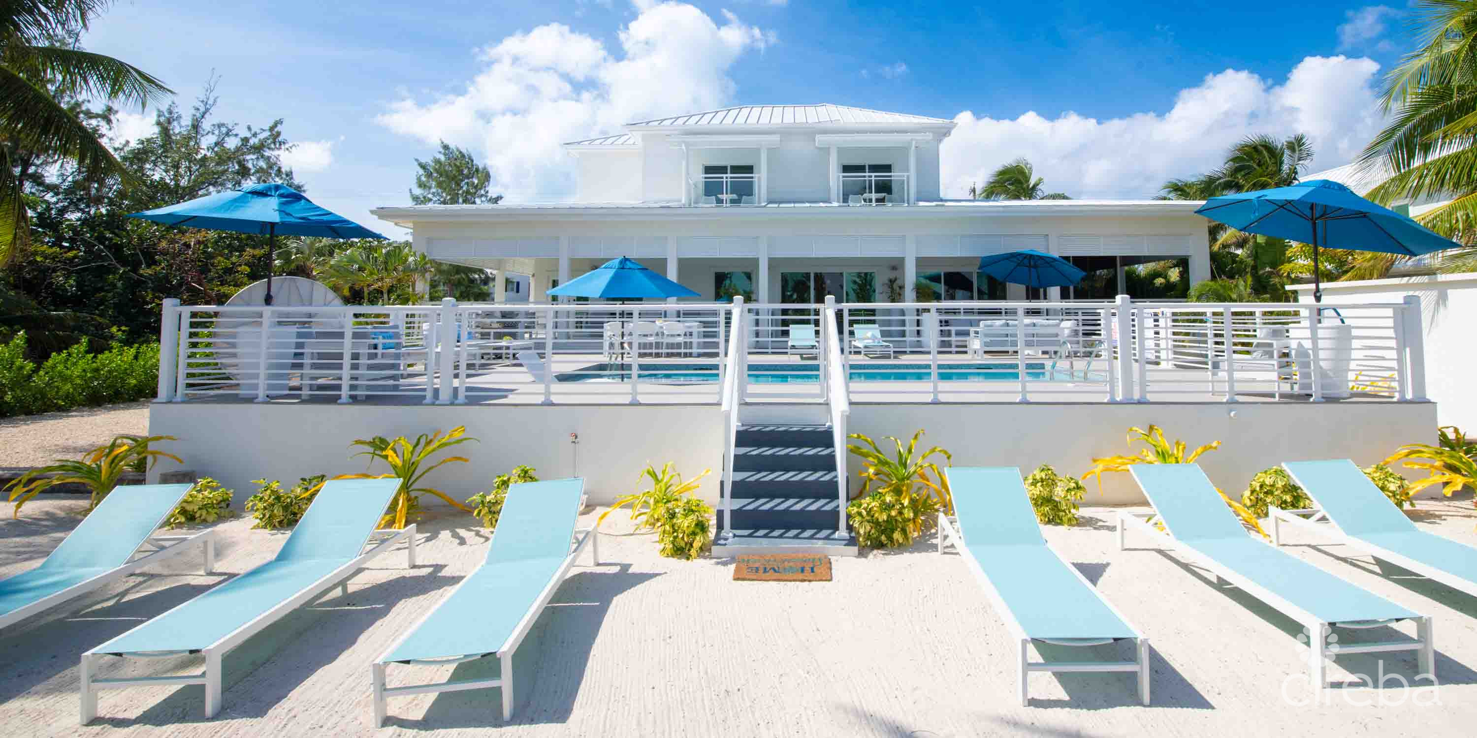 CARIB SUN – EXQUISITE WATERFRONT ESTATE W /GUESTHOUSE IN CAYMAN KAI
