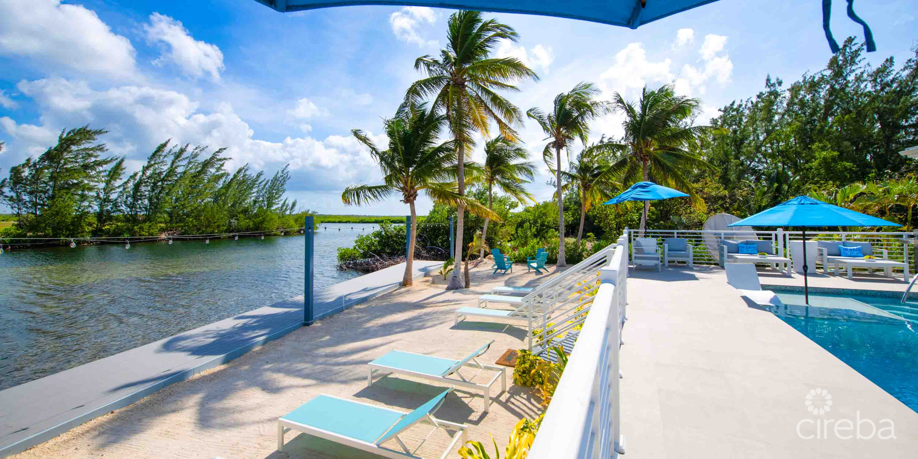 CARIB SUN – EXQUISITE WATERFRONT ESTATE W /GUESTHOUSE IN CAYMAN KAI