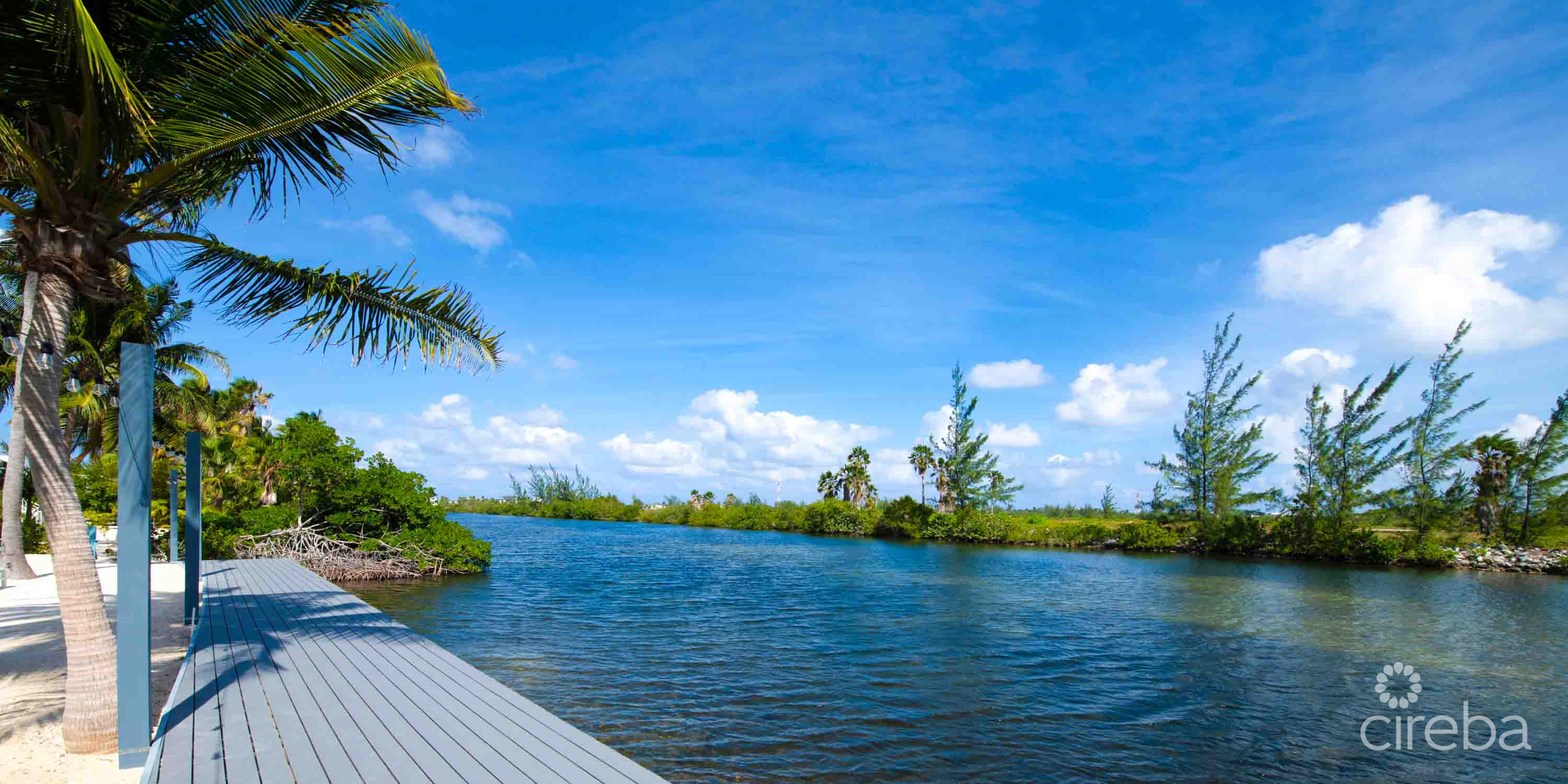 CARIB SUN – EXQUISITE WATERFRONT ESTATE W /GUESTHOUSE IN CAYMAN KAI