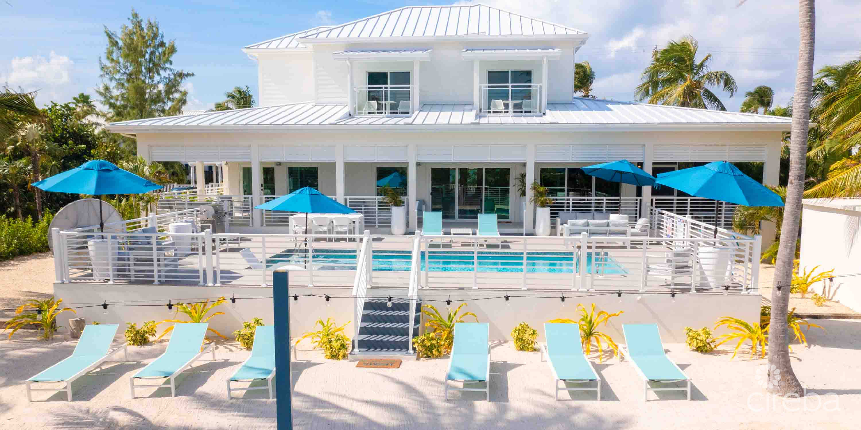 CARIB SUN – EXQUISITE WATERFRONT ESTATE W /GUESTHOUSE IN CAYMAN KAI