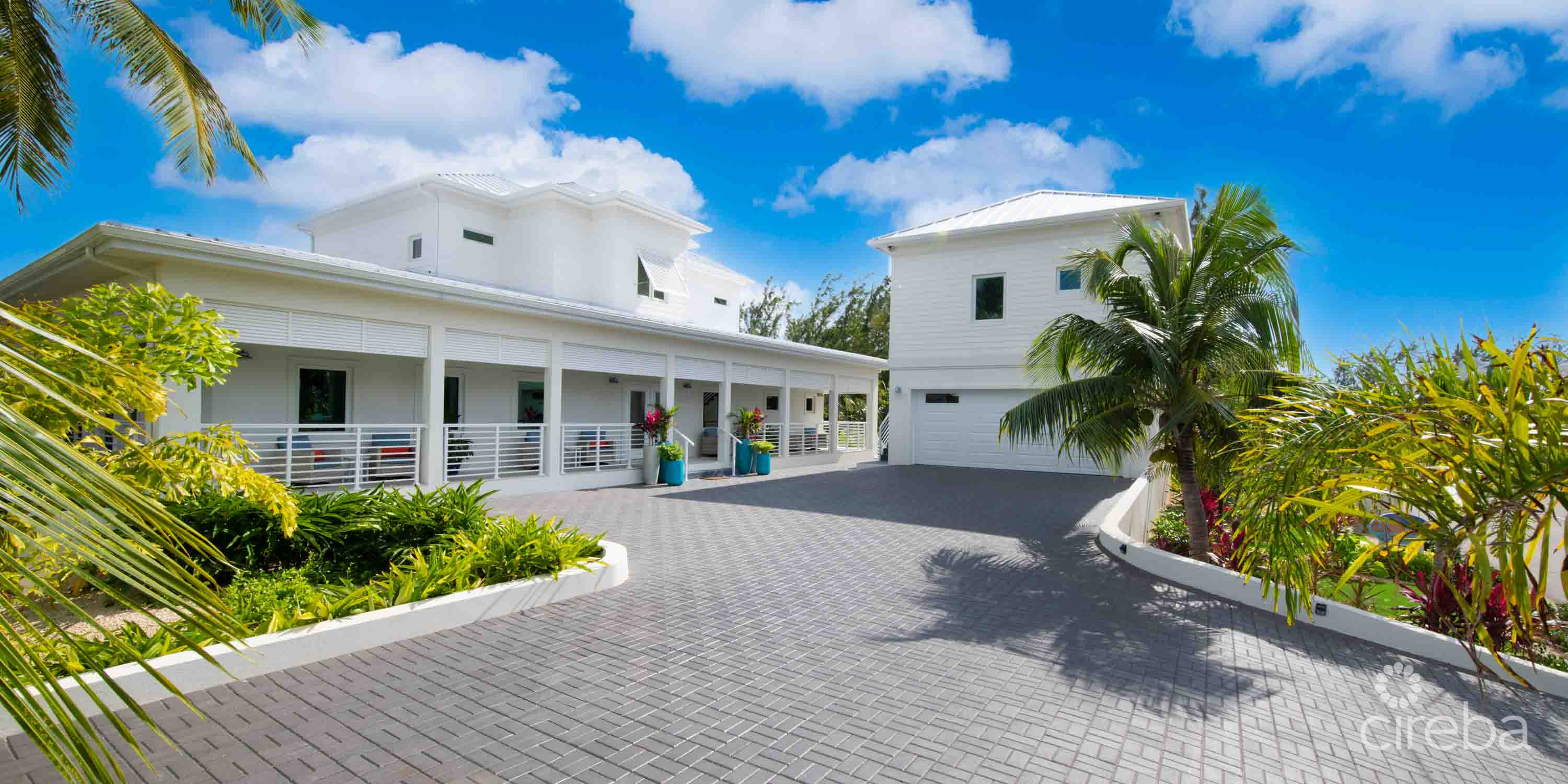 CARIB SUN – EXQUISITE WATERFRONT ESTATE W /GUESTHOUSE IN CAYMAN KAI