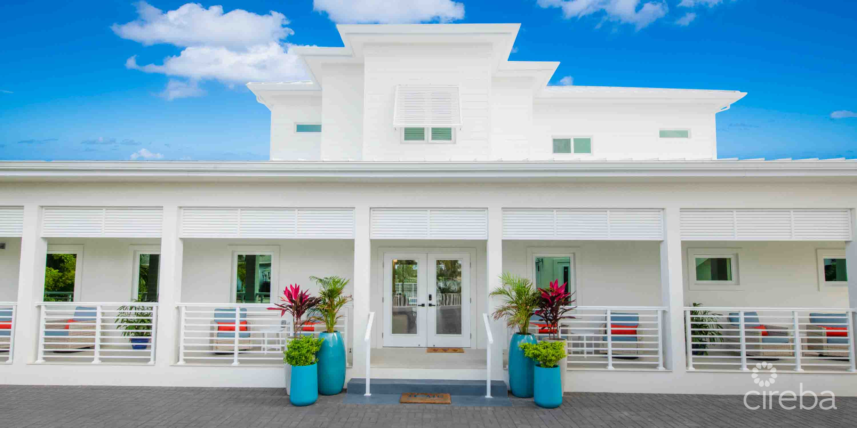CARIB SUN – EXQUISITE WATERFRONT ESTATE W /GUESTHOUSE IN CAYMAN KAI