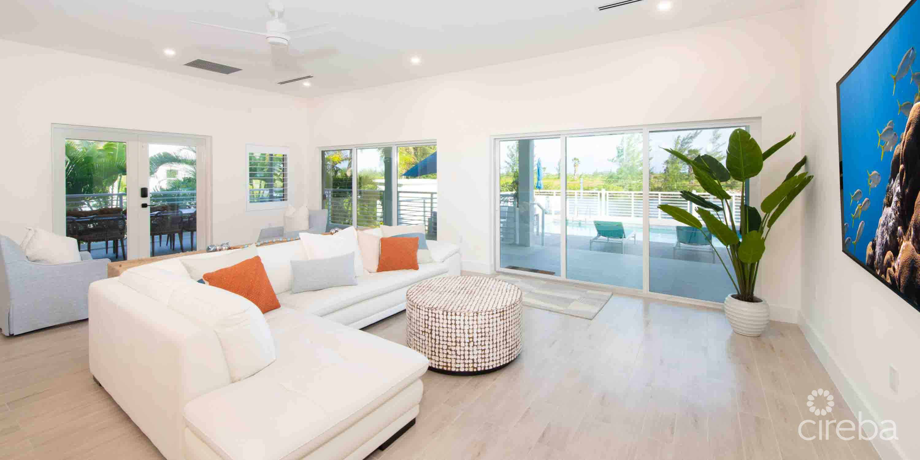 CARIB SUN – EXQUISITE WATERFRONT ESTATE W /GUESTHOUSE IN CAYMAN KAI