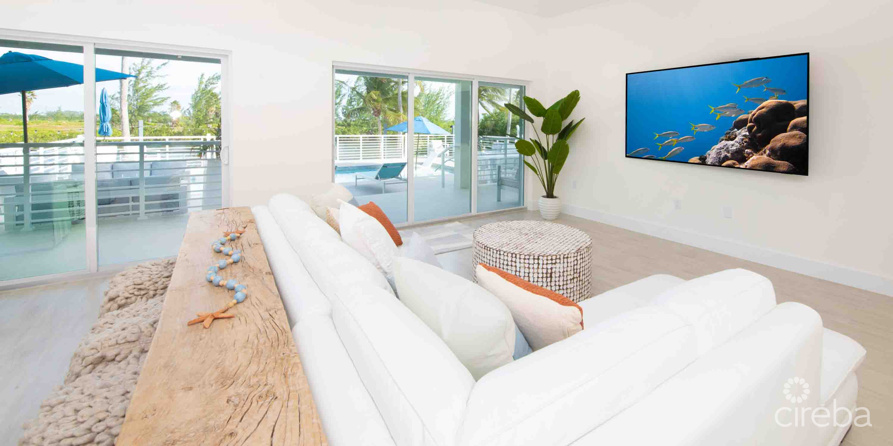 CARIB SUN – EXQUISITE WATERFRONT ESTATE W /GUESTHOUSE IN CAYMAN KAI