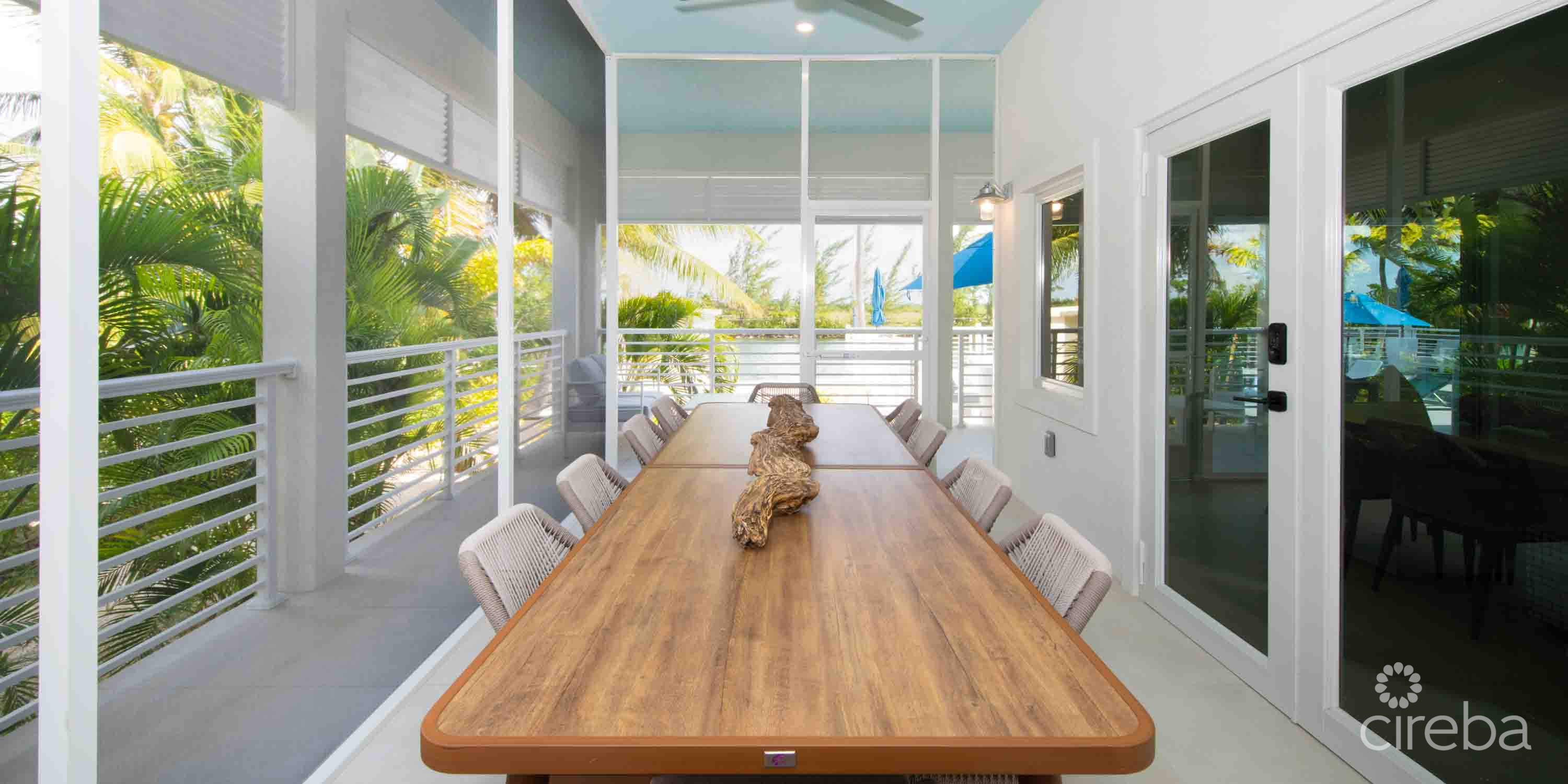 CARIB SUN – EXQUISITE WATERFRONT ESTATE W /GUESTHOUSE IN CAYMAN KAI