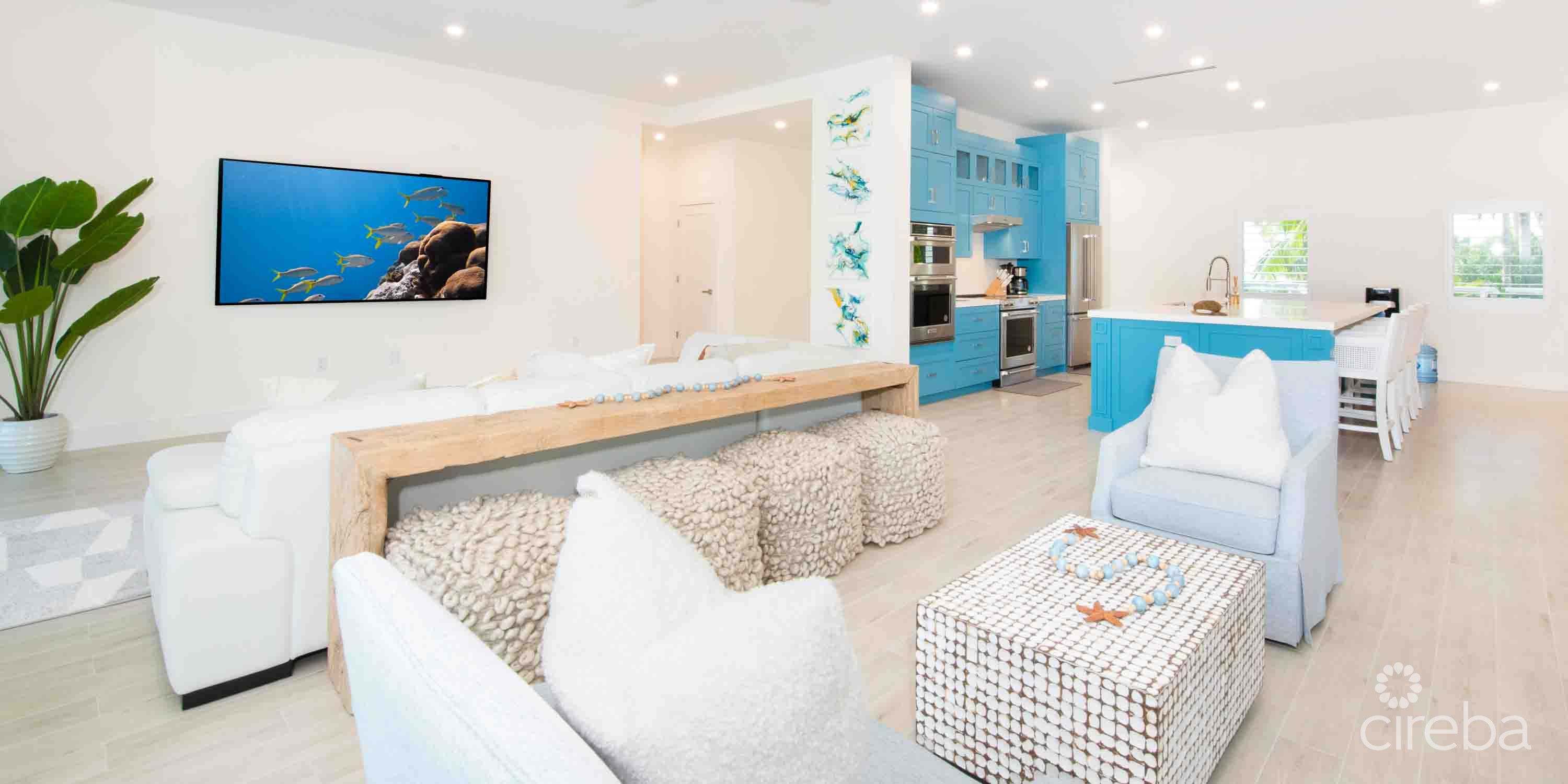 CARIB SUN – EXQUISITE WATERFRONT ESTATE W /GUESTHOUSE IN CAYMAN KAI