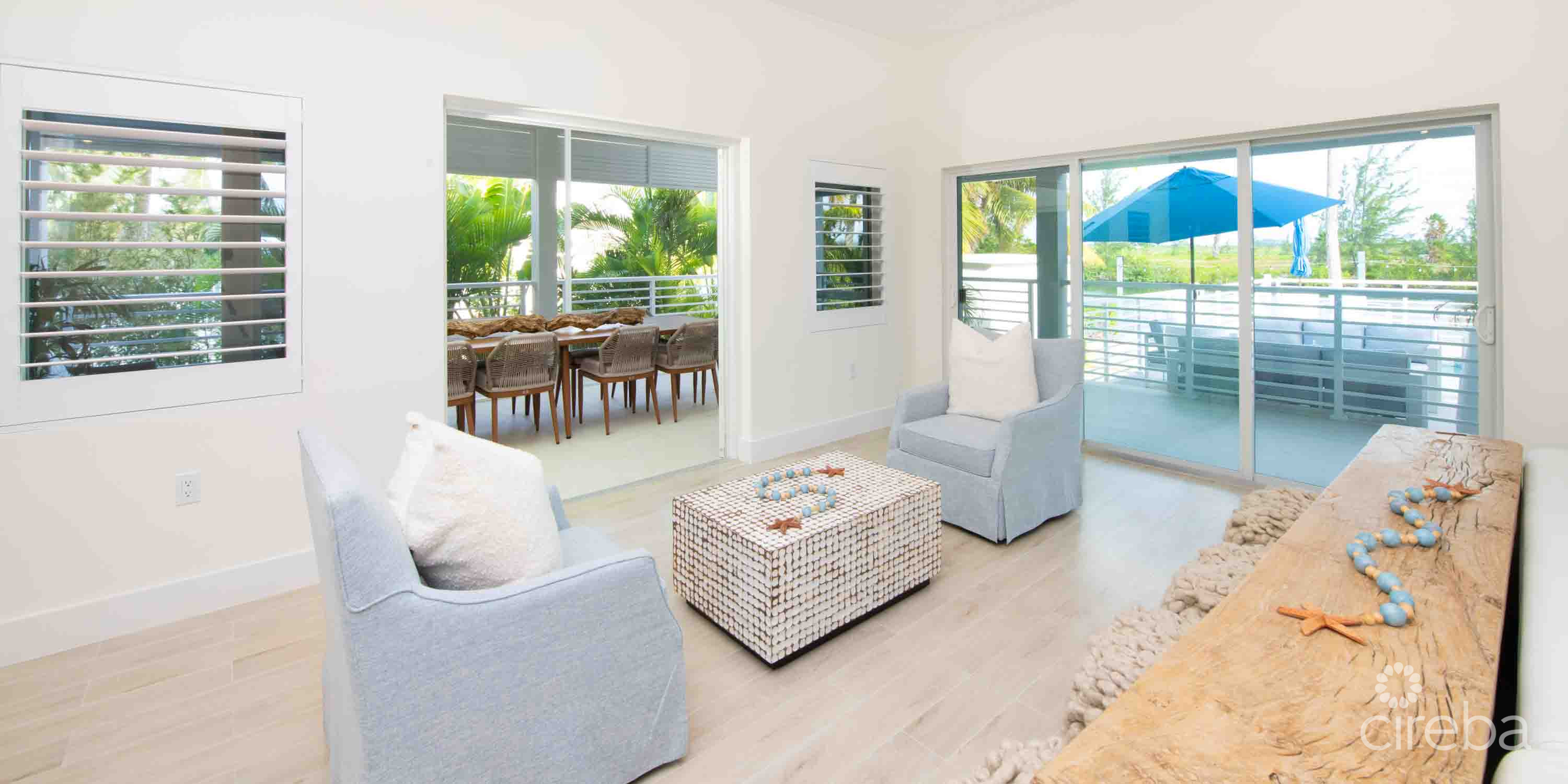 CARIB SUN – EXQUISITE WATERFRONT ESTATE W /GUESTHOUSE IN CAYMAN KAI