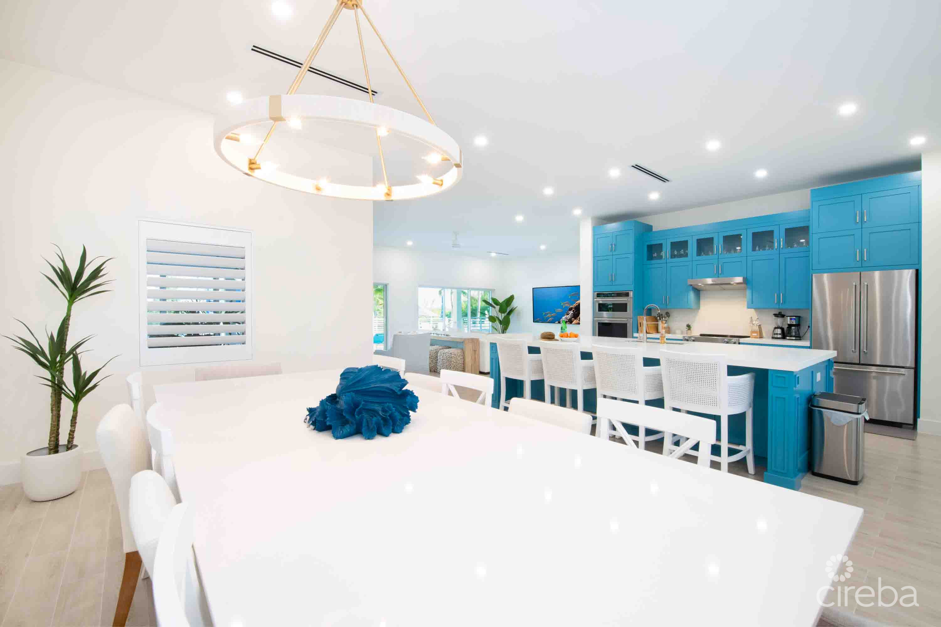CARIB SUN – EXQUISITE WATERFRONT ESTATE W /GUESTHOUSE IN CAYMAN KAI