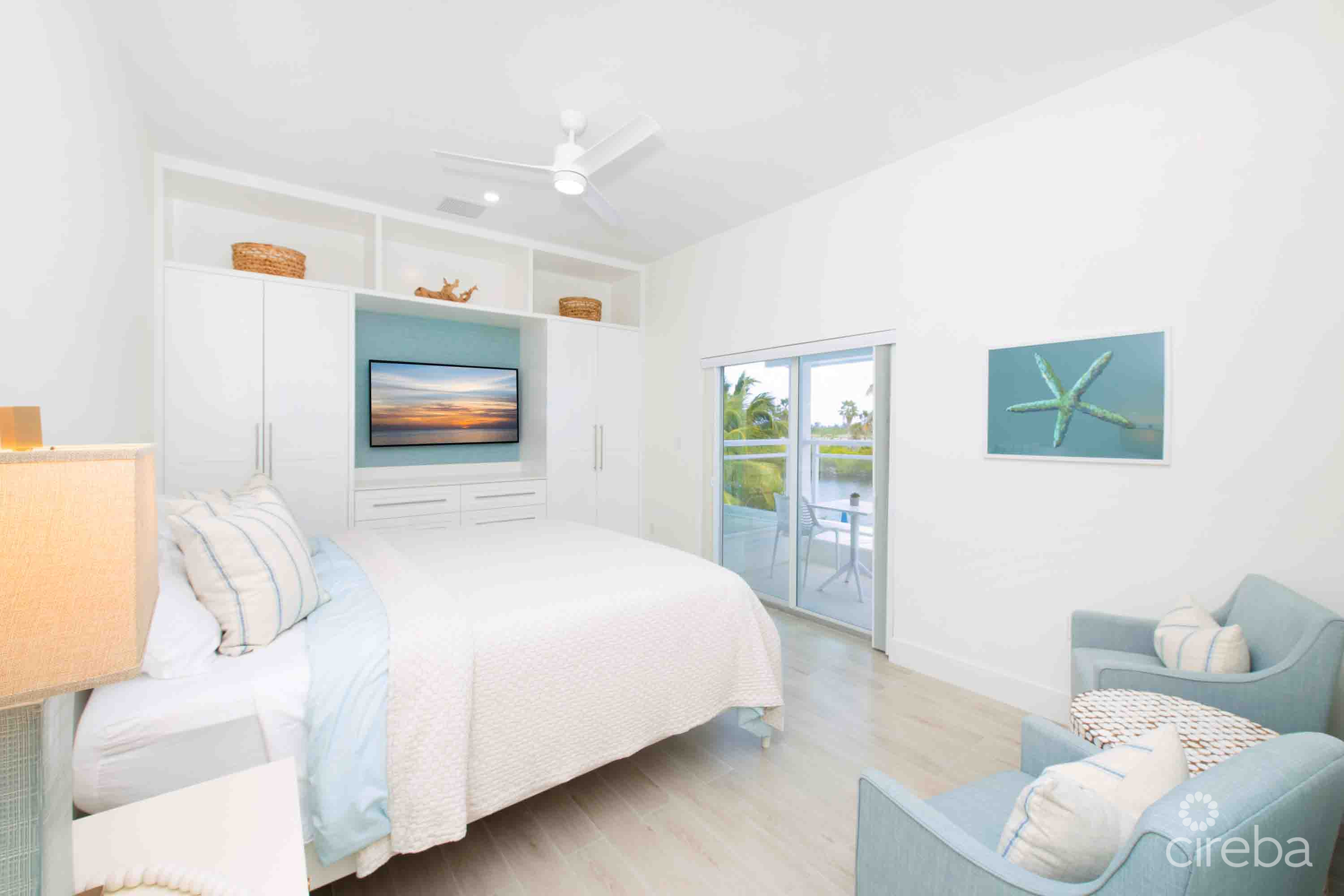 CARIB SUN – EXQUISITE WATERFRONT ESTATE W /GUESTHOUSE IN CAYMAN KAI