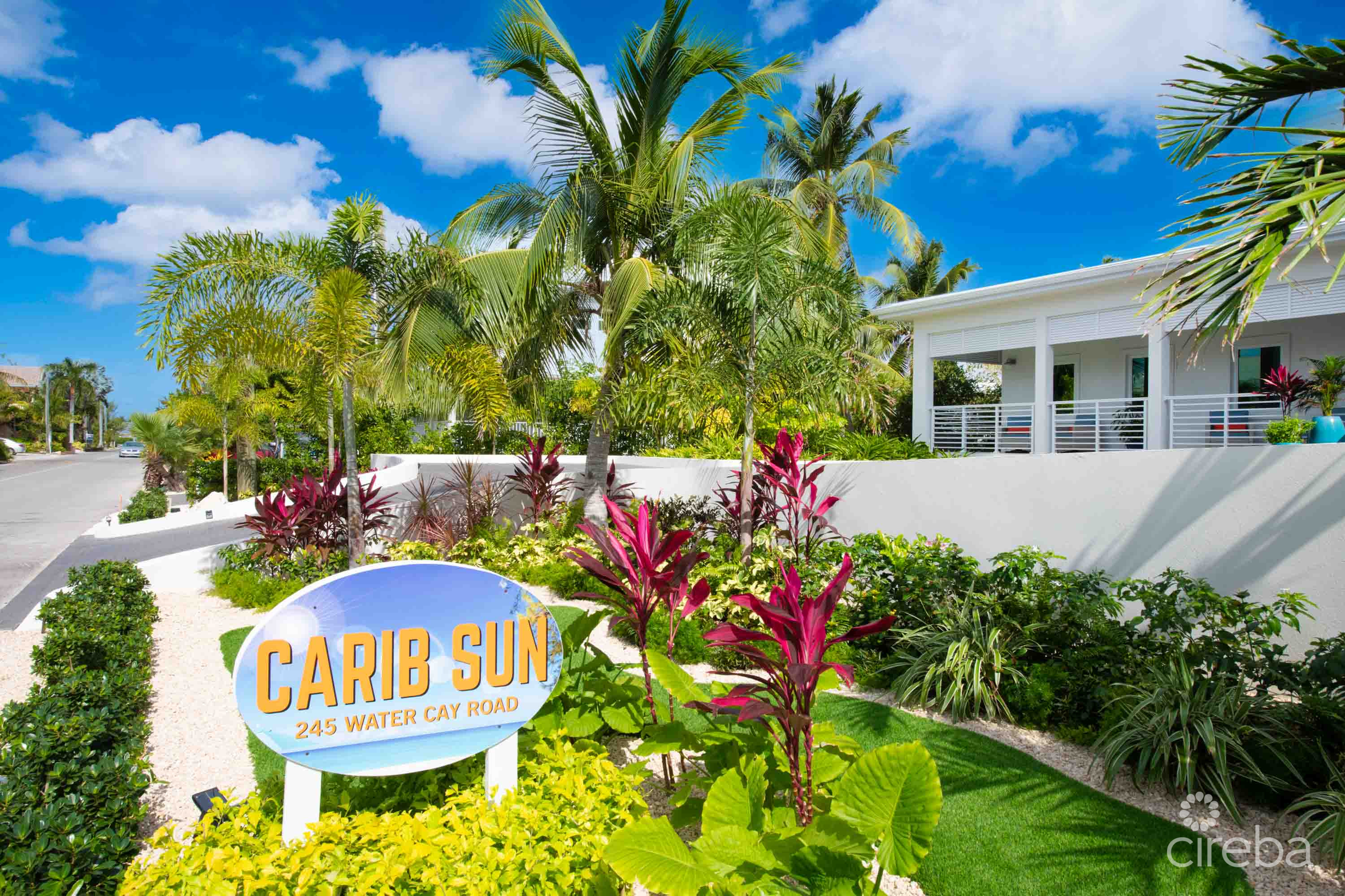 CARIB SUN – EXQUISITE WATERFRONT ESTATE W /GUESTHOUSE IN CAYMAN KAI