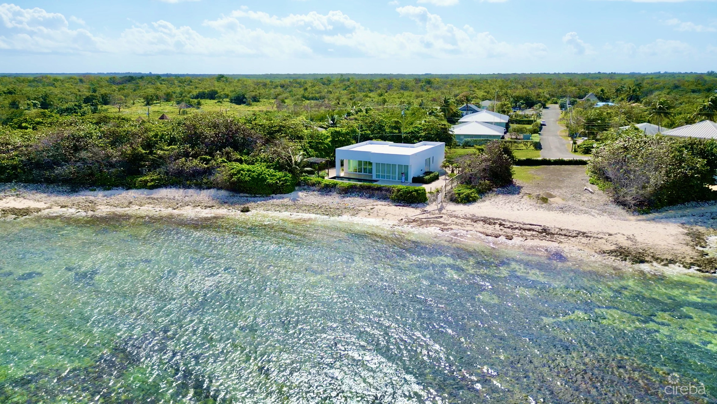SEASIDE HIDEAWAY – FULLY RENOVATED BEACHFRONT GEM