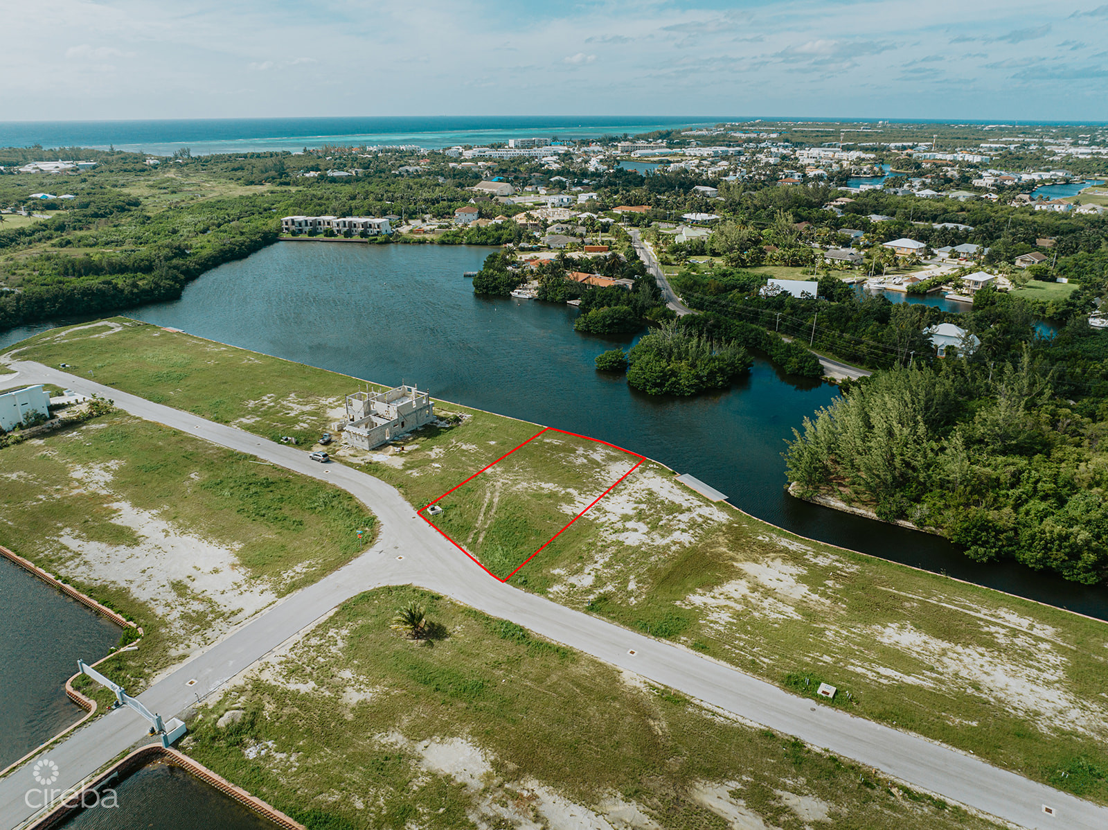 LARGEST LOT IN MUSTIQUE COVE – 0.31 ACRE CANAL LOT