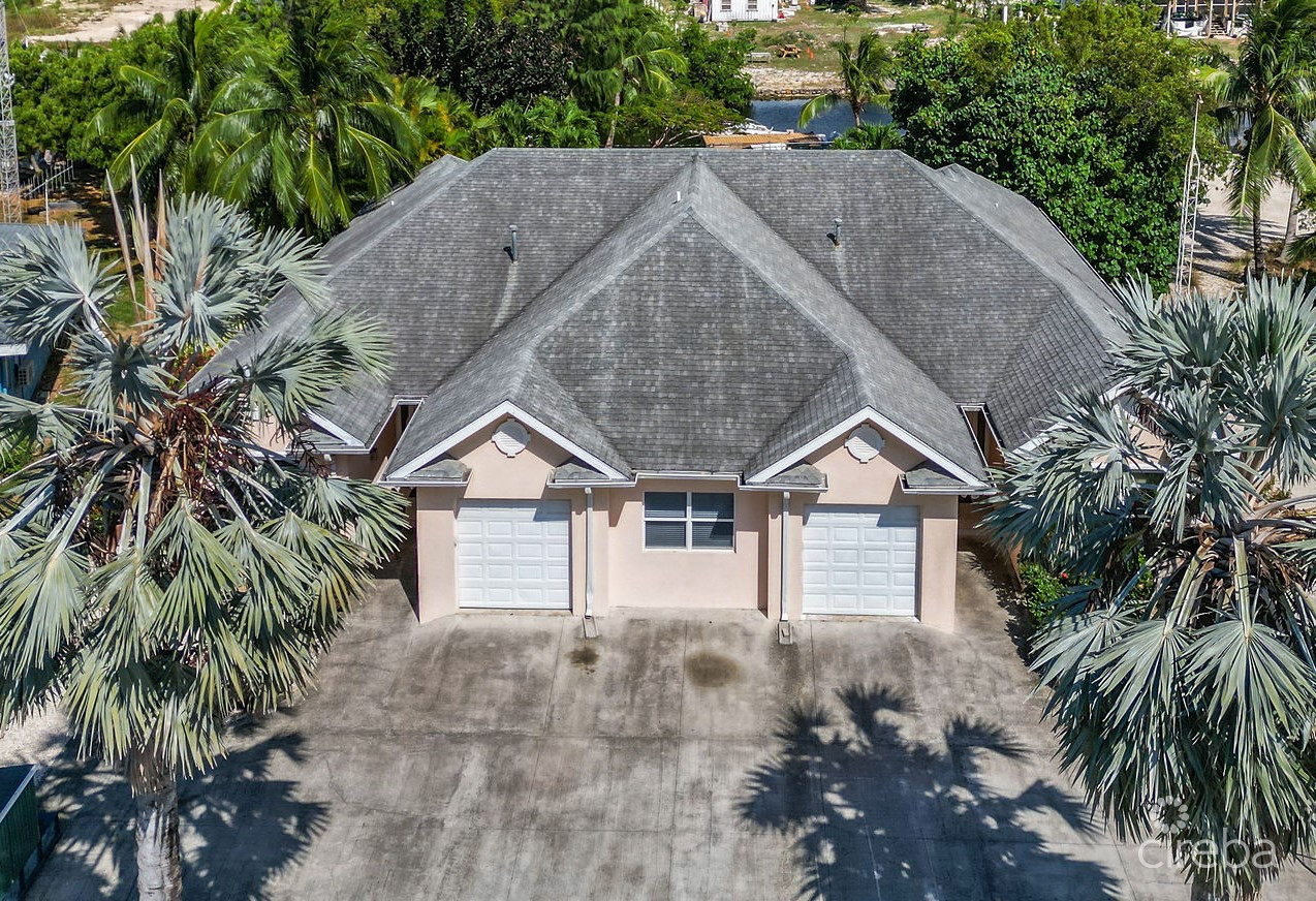 4,465 SF CANAL FRONT DUPLEX WITH POOL  (BOTH SIDES – OR INDIVIDUALLY)