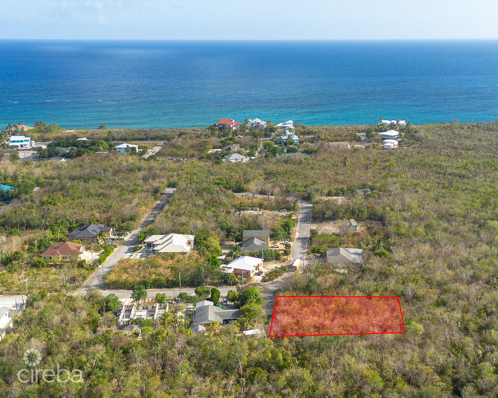 BEACH BAY LOT – 0.34 ACRE IN NATURE’S CIRCLE