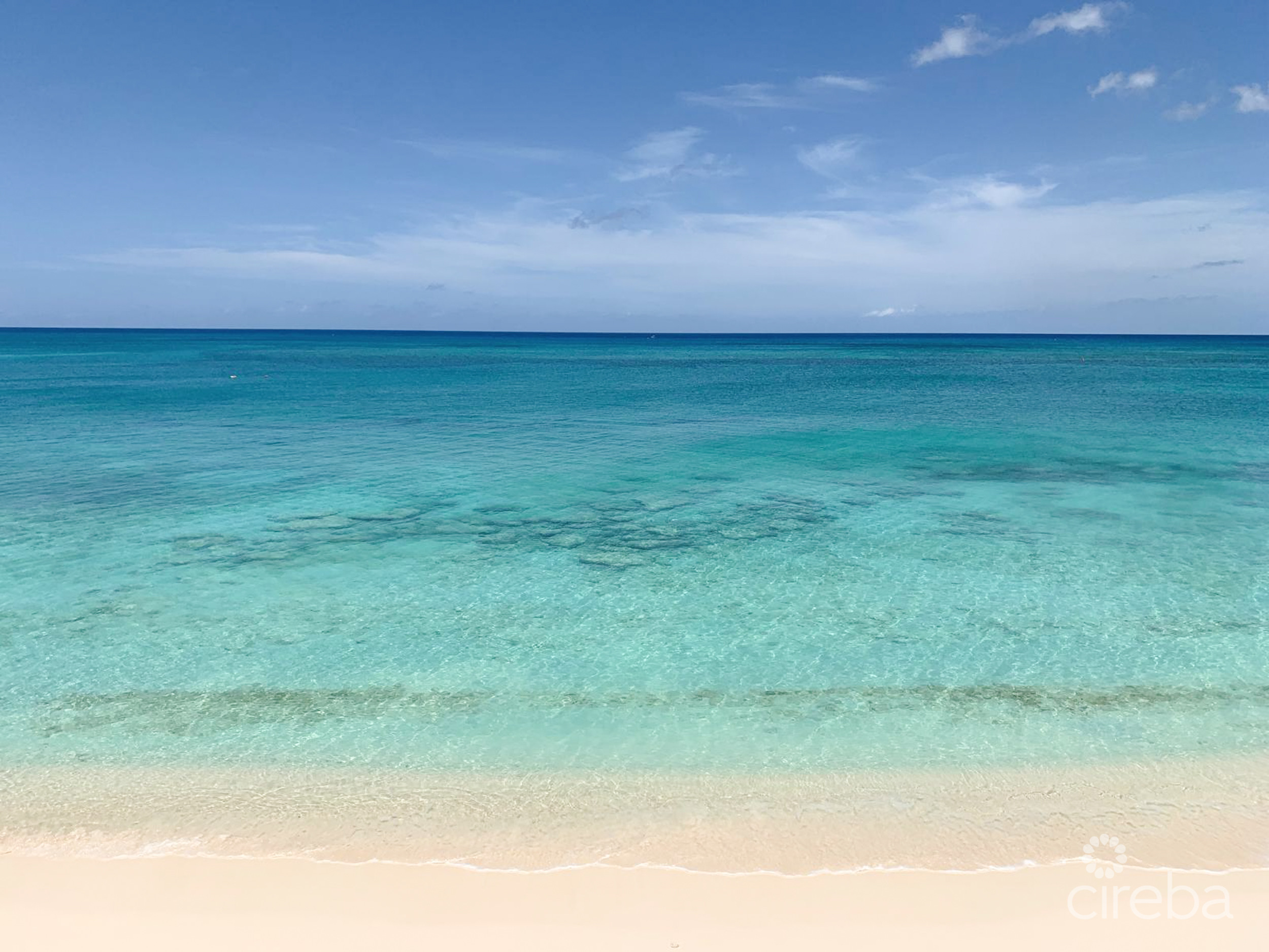CAYMAN REEF RESORT BEACHFRONT WITH FUTURE REDEVELOPMENT