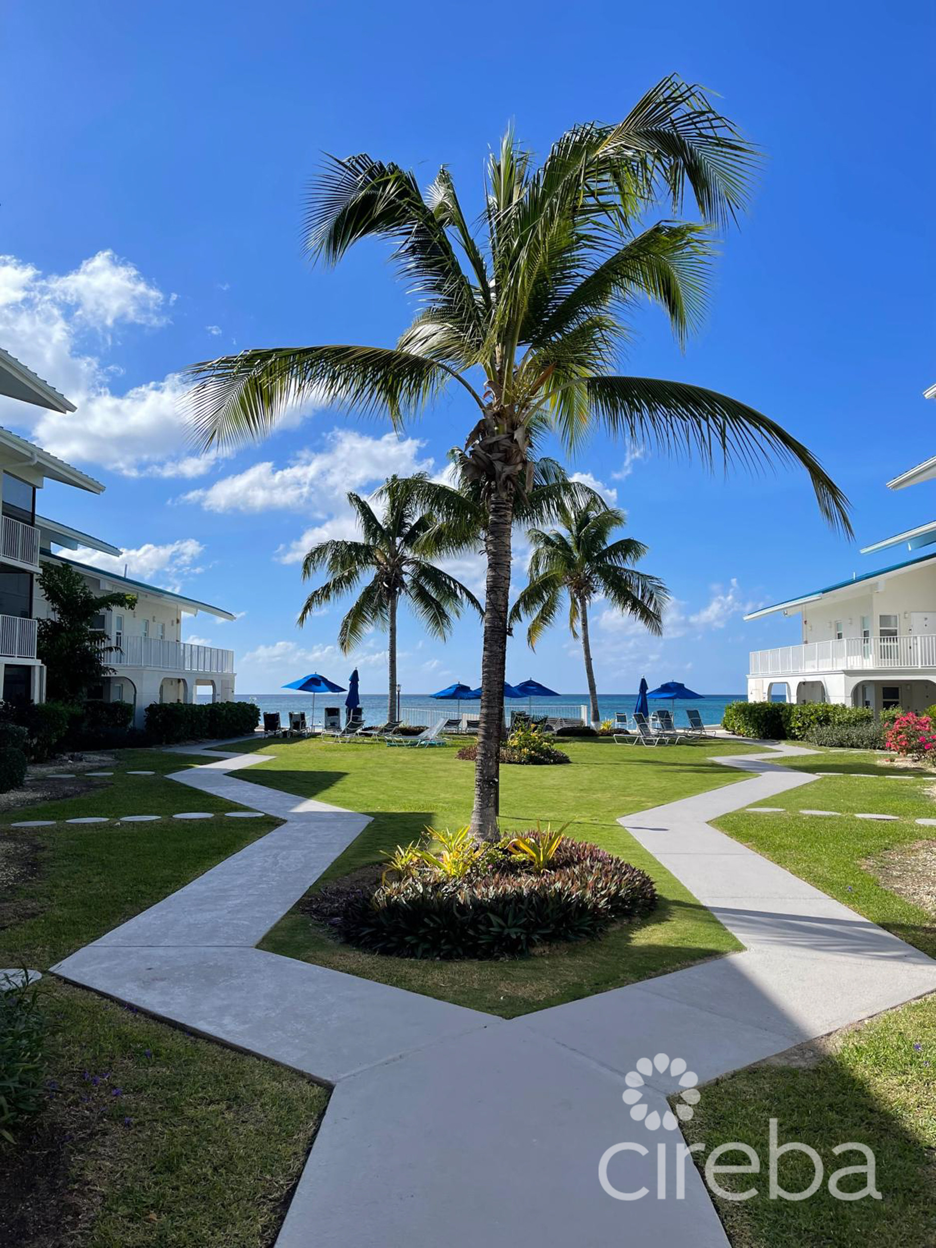 CAYMAN REEF RESORT BEACHFRONT WITH FUTURE REDEVELOPMENT