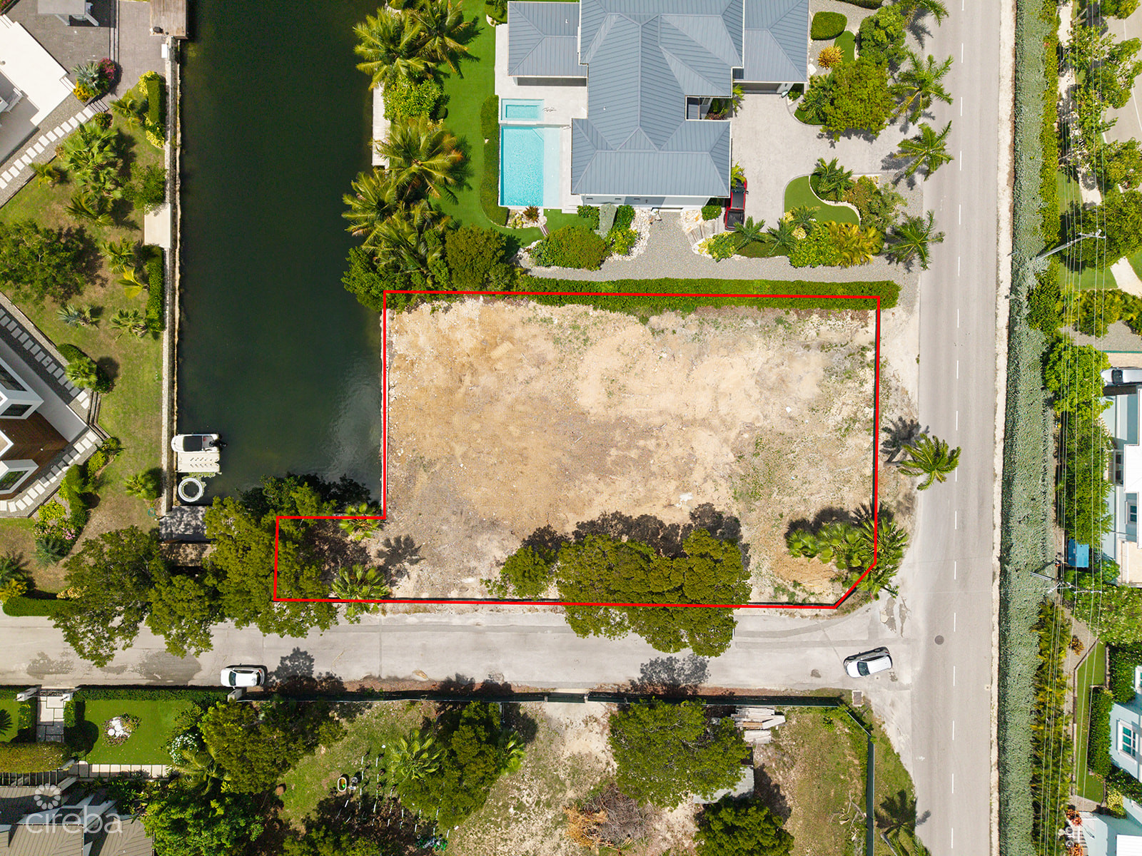 RARE CORNER WATERFRONT PARCEL IN THE YACHT CLUB