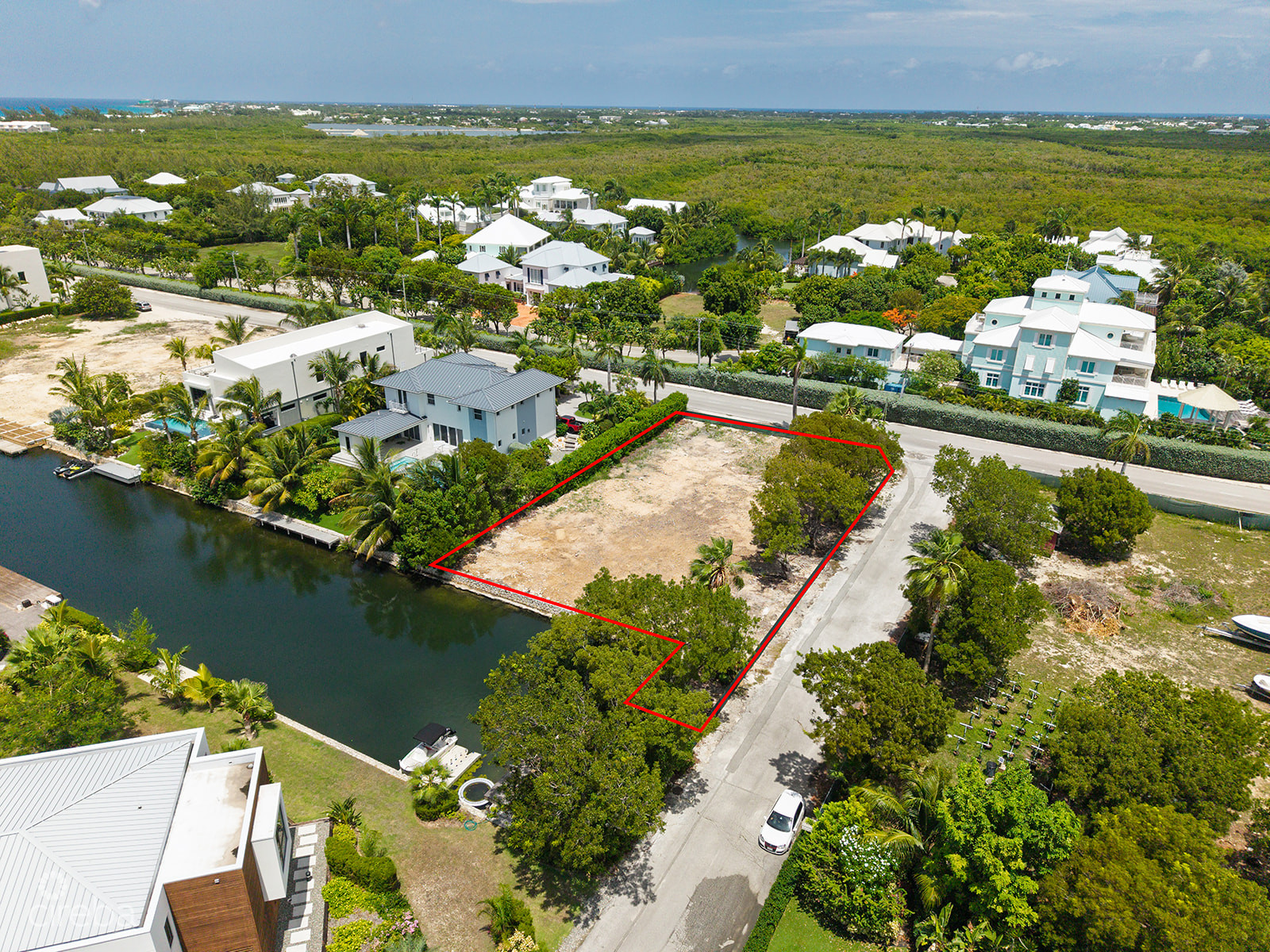 RARE CORNER WATERFRONT PARCEL IN THE YACHT CLUB