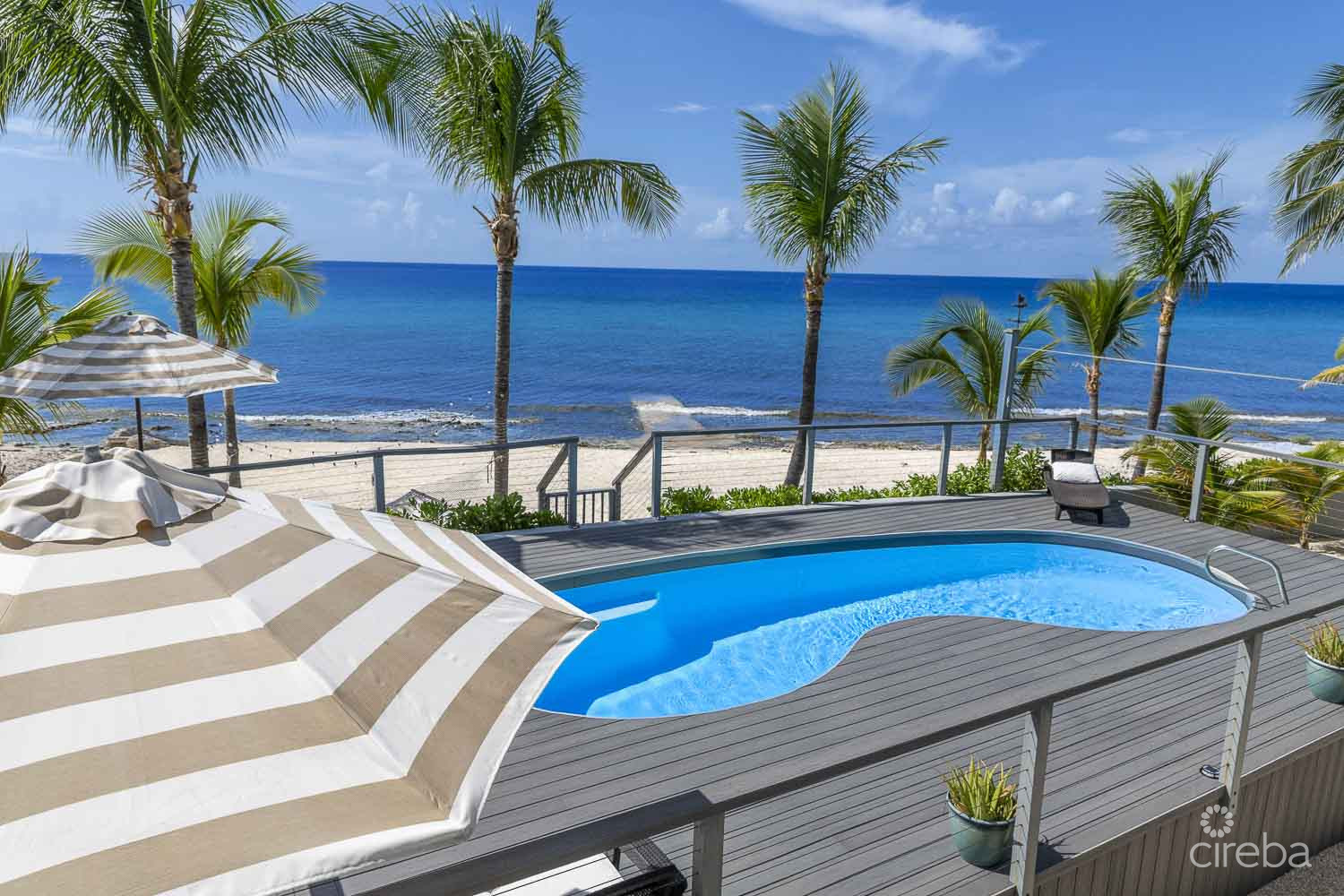 A WAVE FROM IT ALL – FULLY RENO’D 4 BED OCEANFRONT