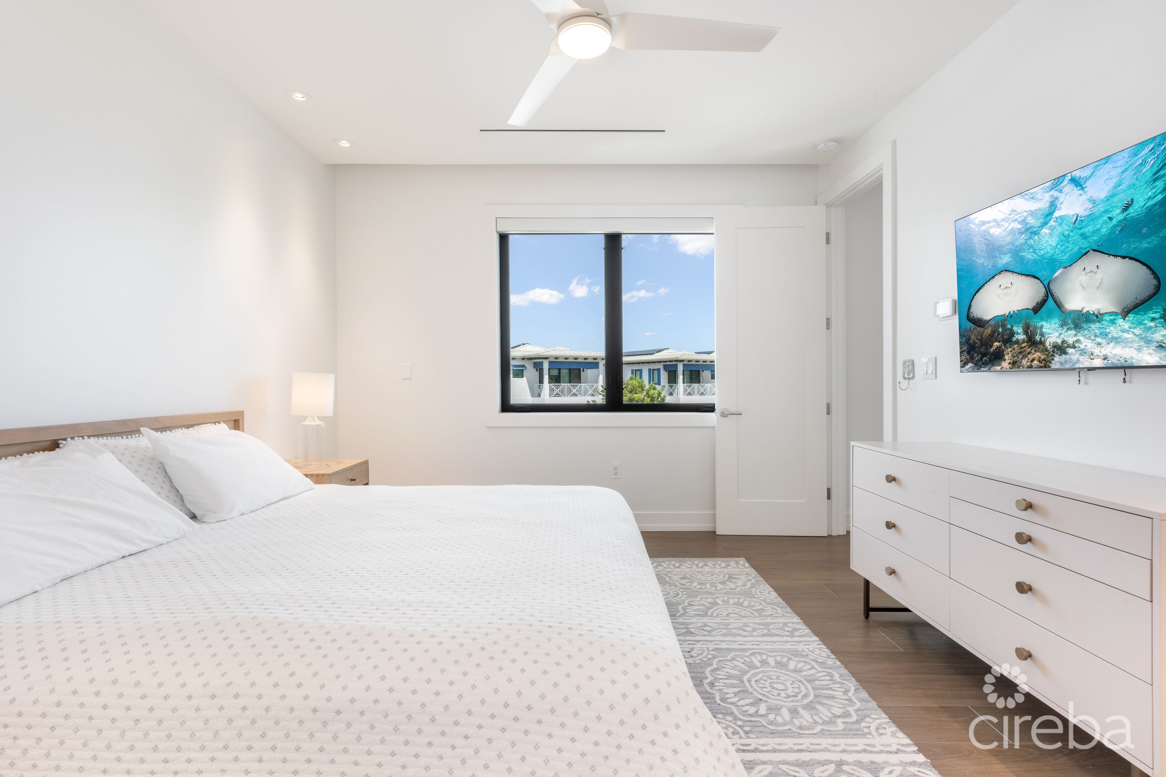 OLEA CONDO #321 – CAMANA BAY