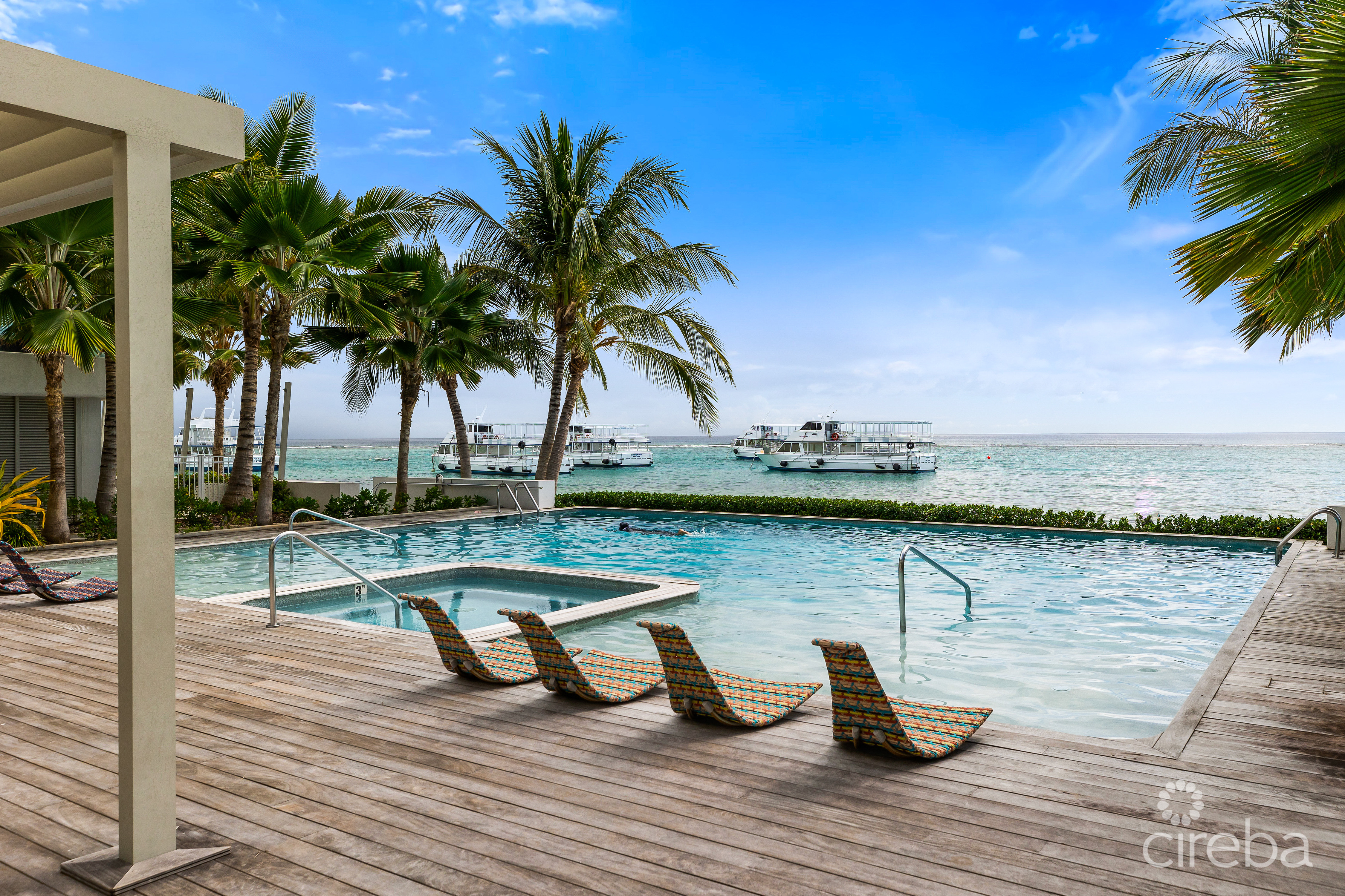 TIDES –  BEACHFRONT, LUXURY 4 BEDROOM CONDO WITH TERRACE