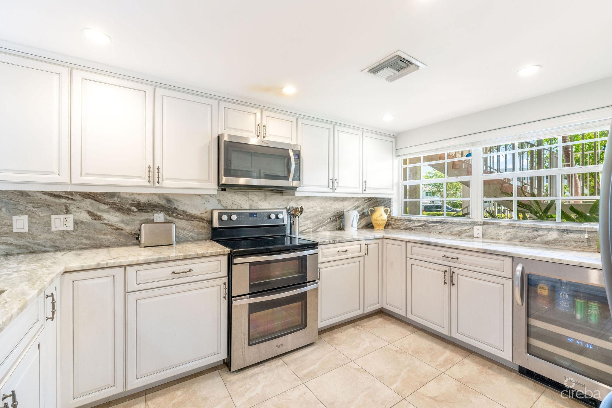 BRITANNIA LIONS COURT  UNIT #213 – 1-BEDROOM GARDEN VIEW CONDO