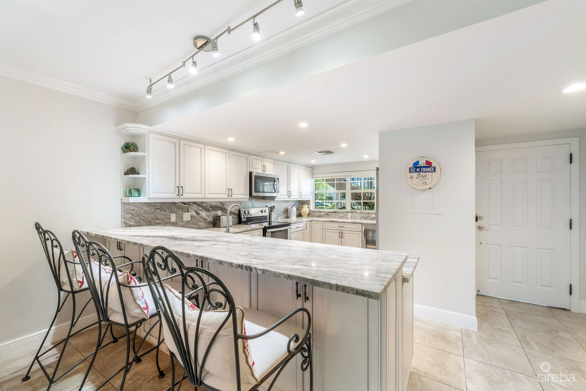 BRITANNIA LIONS COURT  UNIT #213 – 1-BEDROOM GARDEN VIEW CONDO