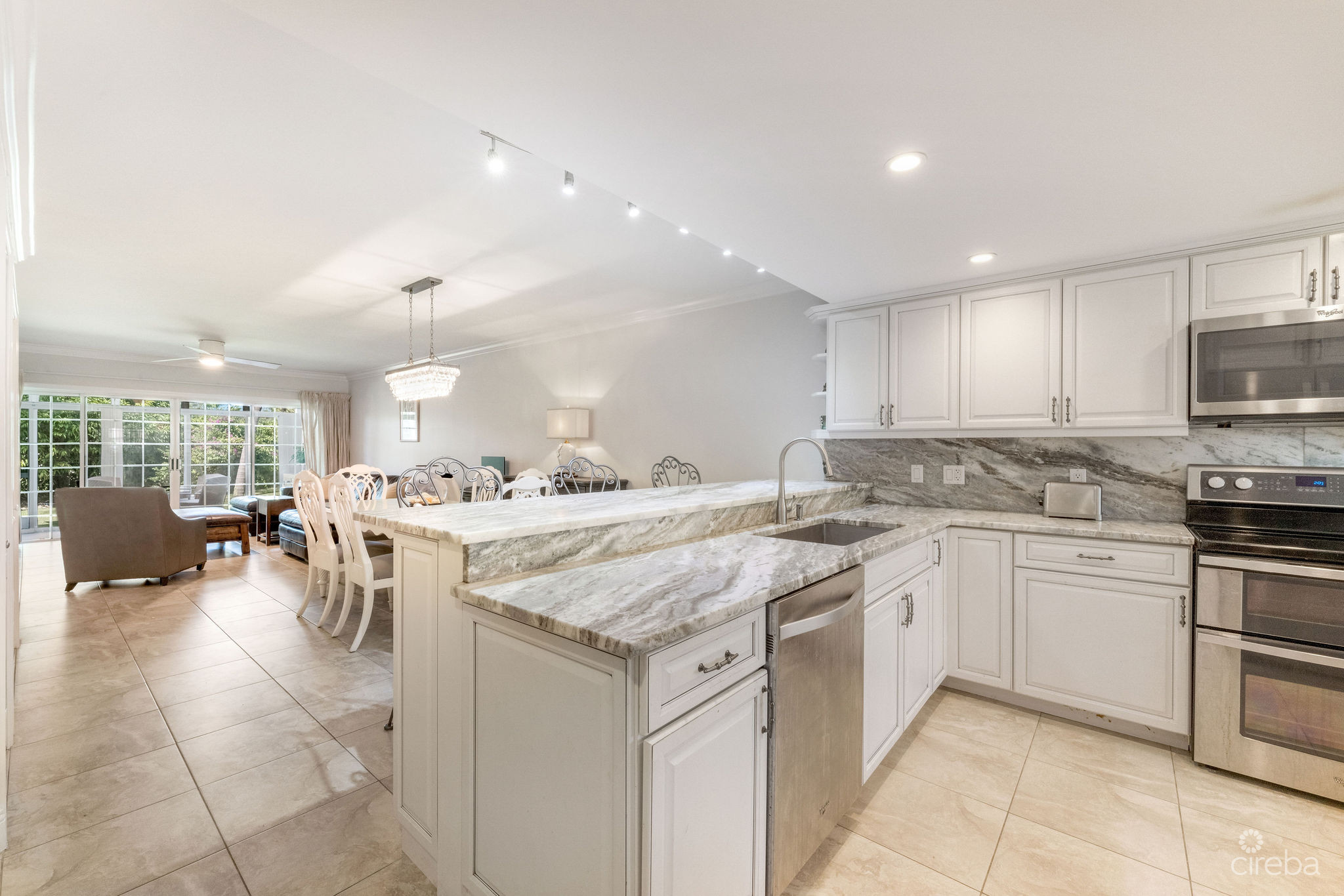 BRITANNIA LIONS COURT  UNIT #213 – 1-BEDROOM GARDEN VIEW CONDO