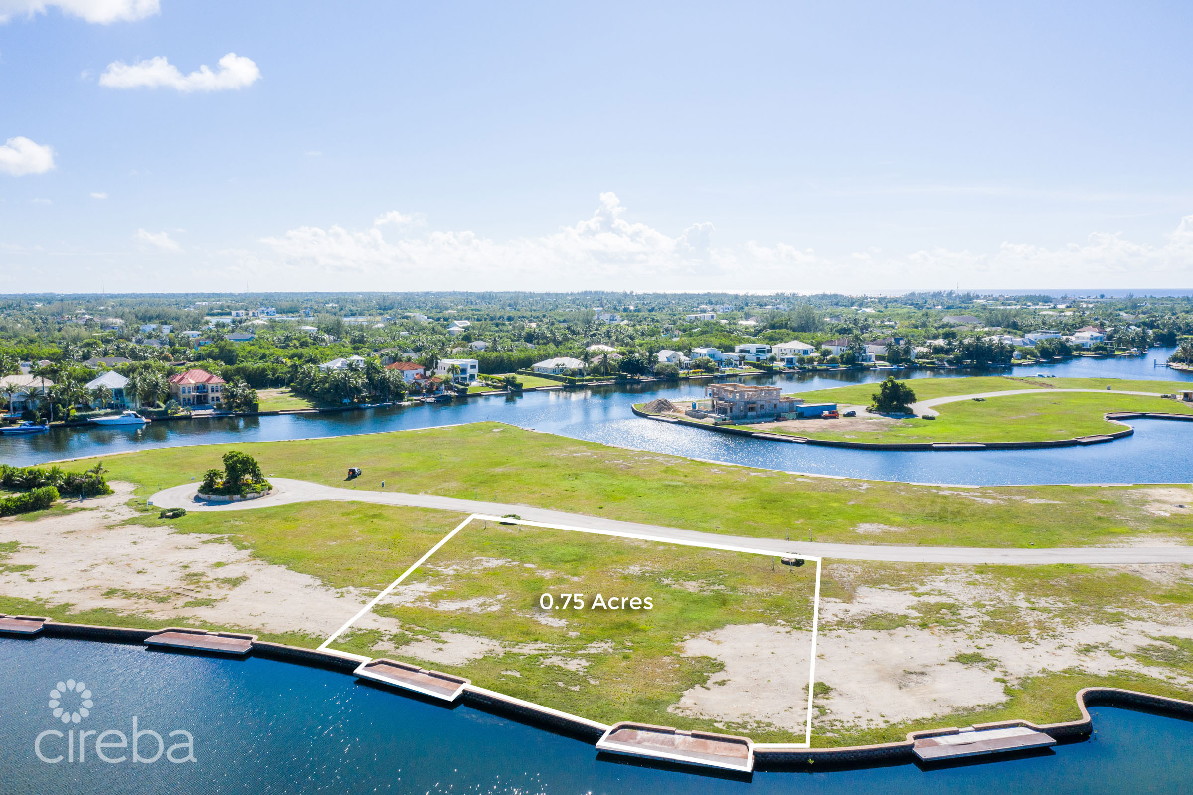HARBOUR REACH 0.75 ACRE, CANAL FRONT LAND