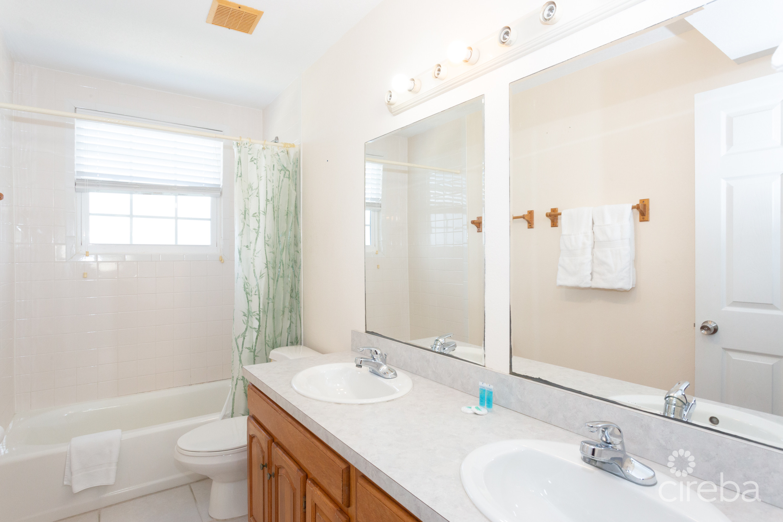 CARIB SANDS, BEACHFRONT LIVING CAYMAN BRAC