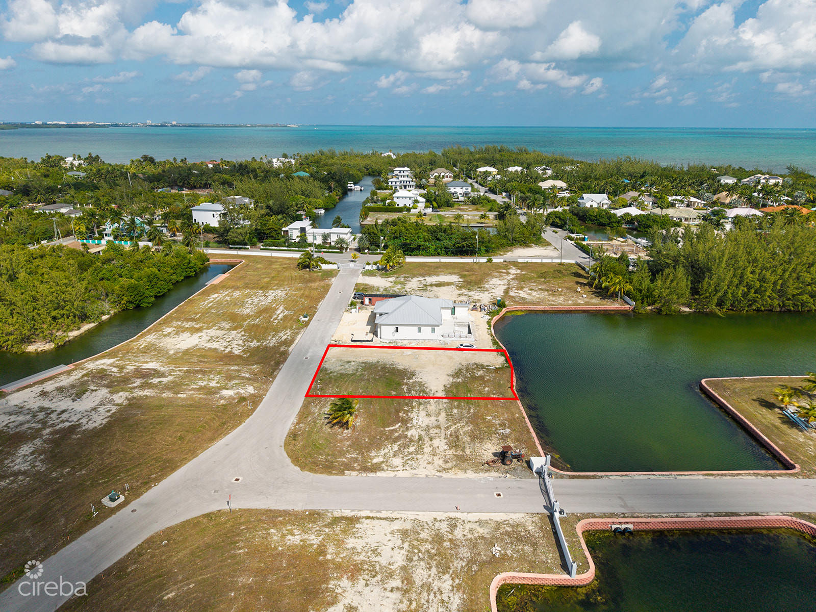 0.24 ACRE CANAL LOT IN GATED COMMUNITY – MUSTIQUE COVE