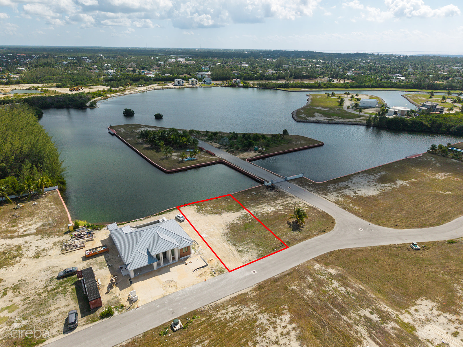 0.24 ACRE CANAL LOT IN GATED COMMUNITY – MUSTIQUE COVE