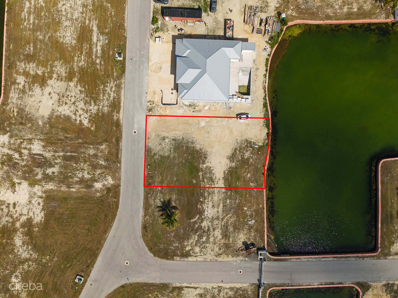 0.24 ACRE CANAL LOT IN GATED COMMUNITY – MUSTIQUE COVE