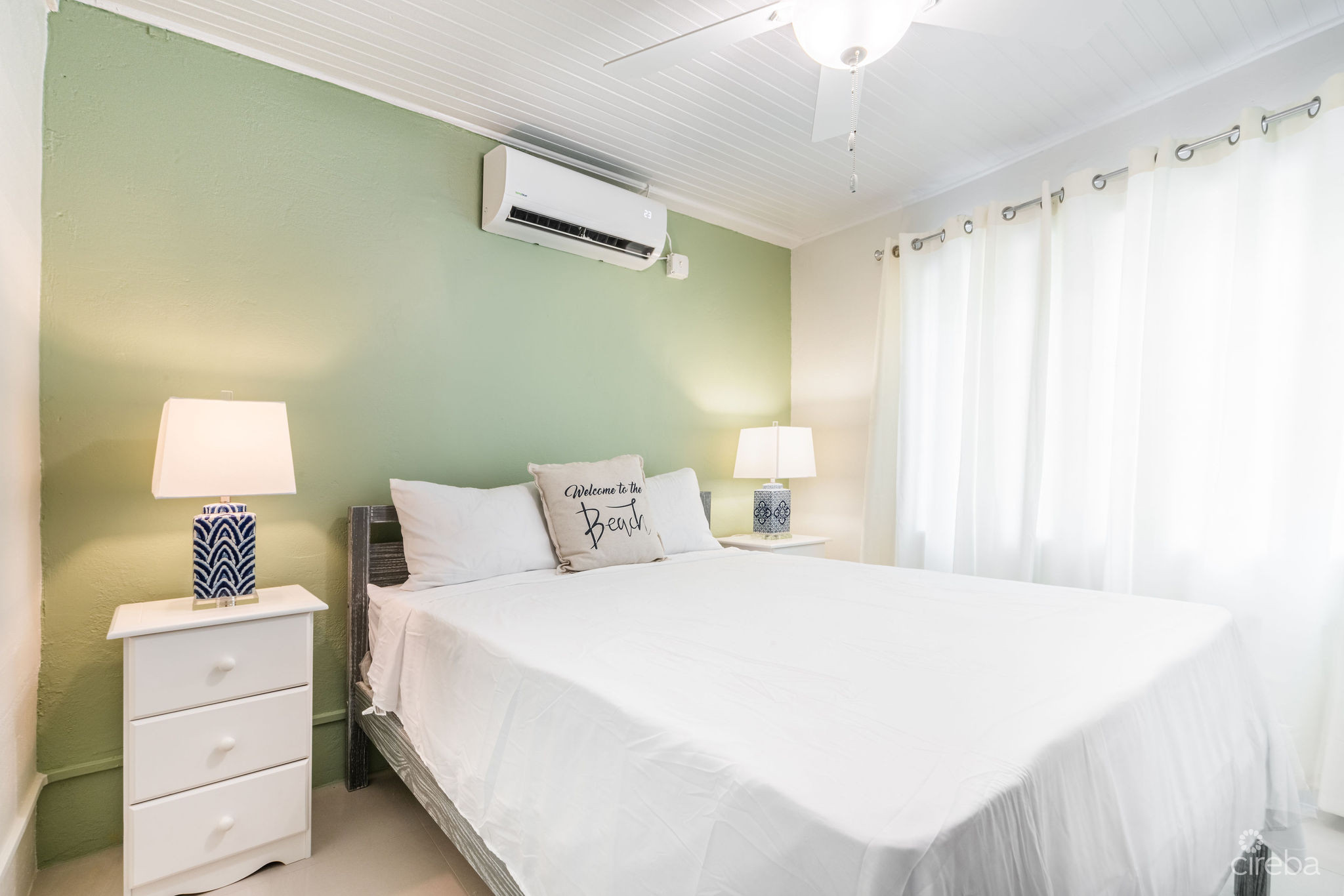 CHARMING OCEANVIEW COTTAGE ACROSS FROM THE SEA ON EXPANSIVE 0.89 ACRE LOT