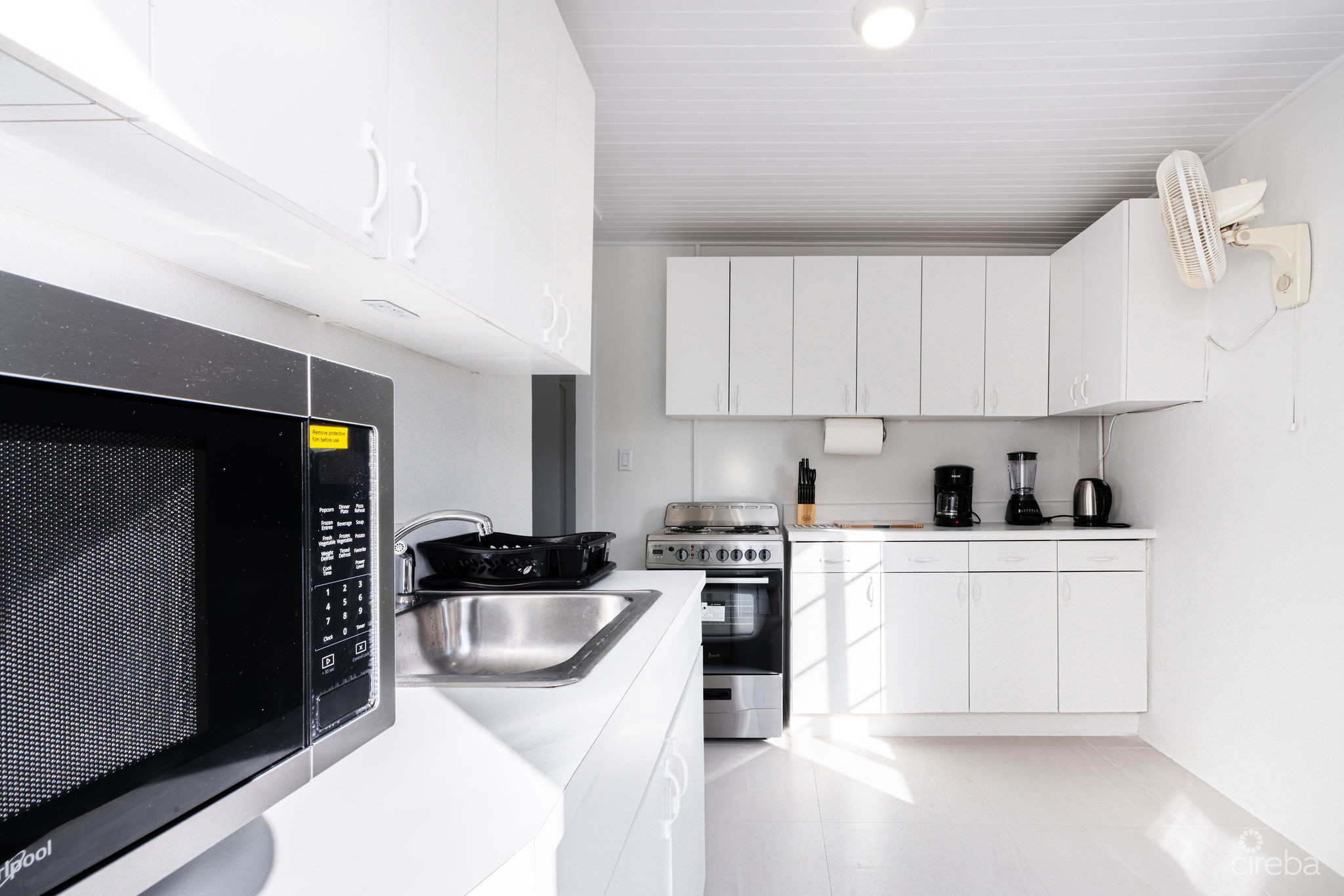 CHARMING OCEANVIEW COTTAGE ACROSS FROM THE SEA ON EXPANSIVE 0.89 ACRE LOT