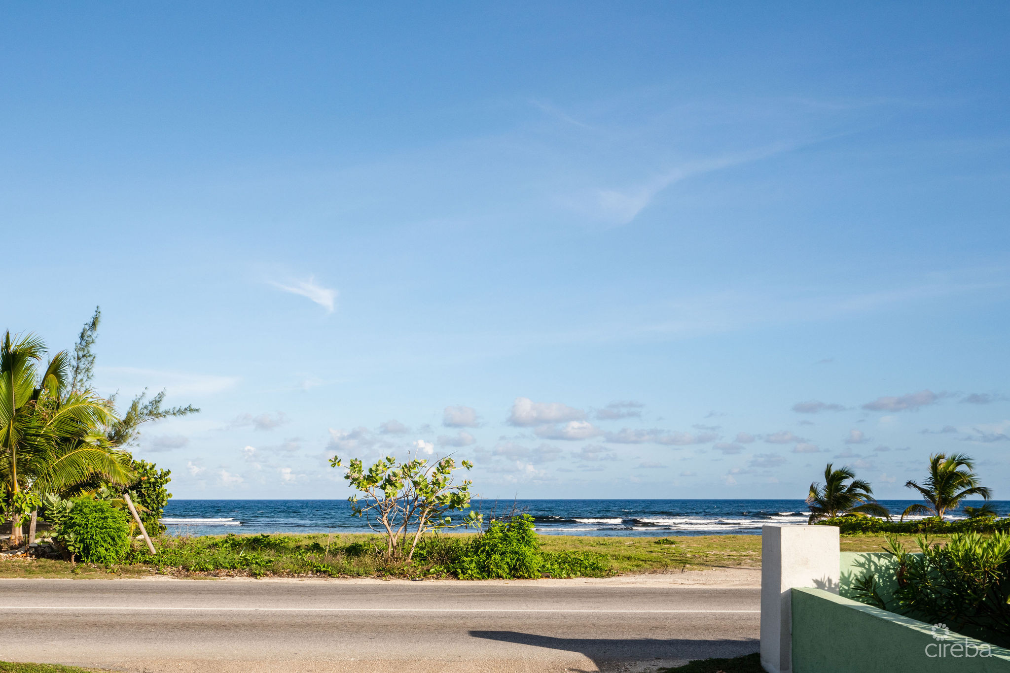 CHARMING OCEANVIEW COTTAGE ACROSS FROM THE SEA ON EXPANSIVE 0.89 ACRE LOT