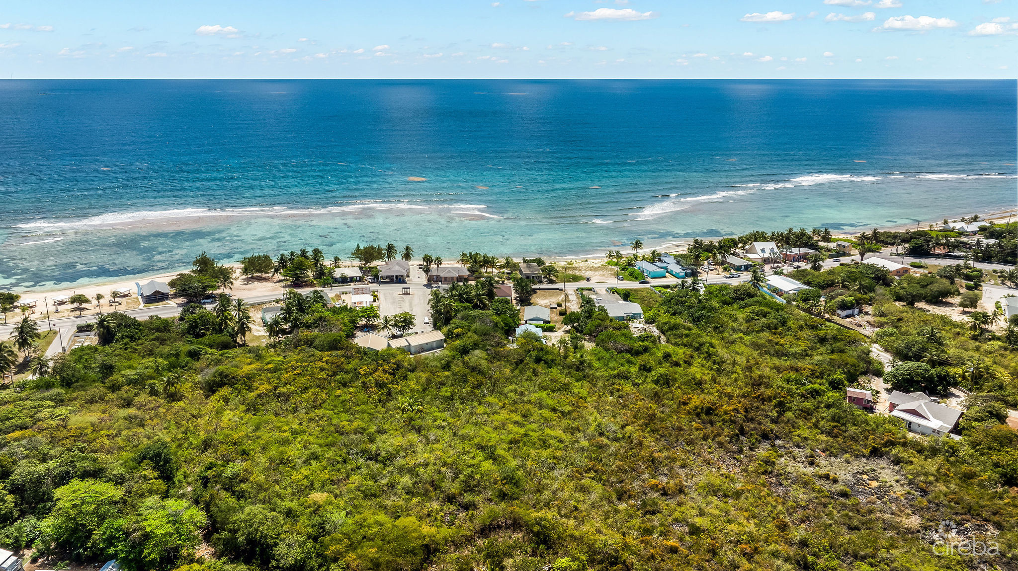 CHARMING OCEANVIEW COTTAGE ACROSS FROM THE SEA ON EXPANSIVE 0.89 ACRE LOT