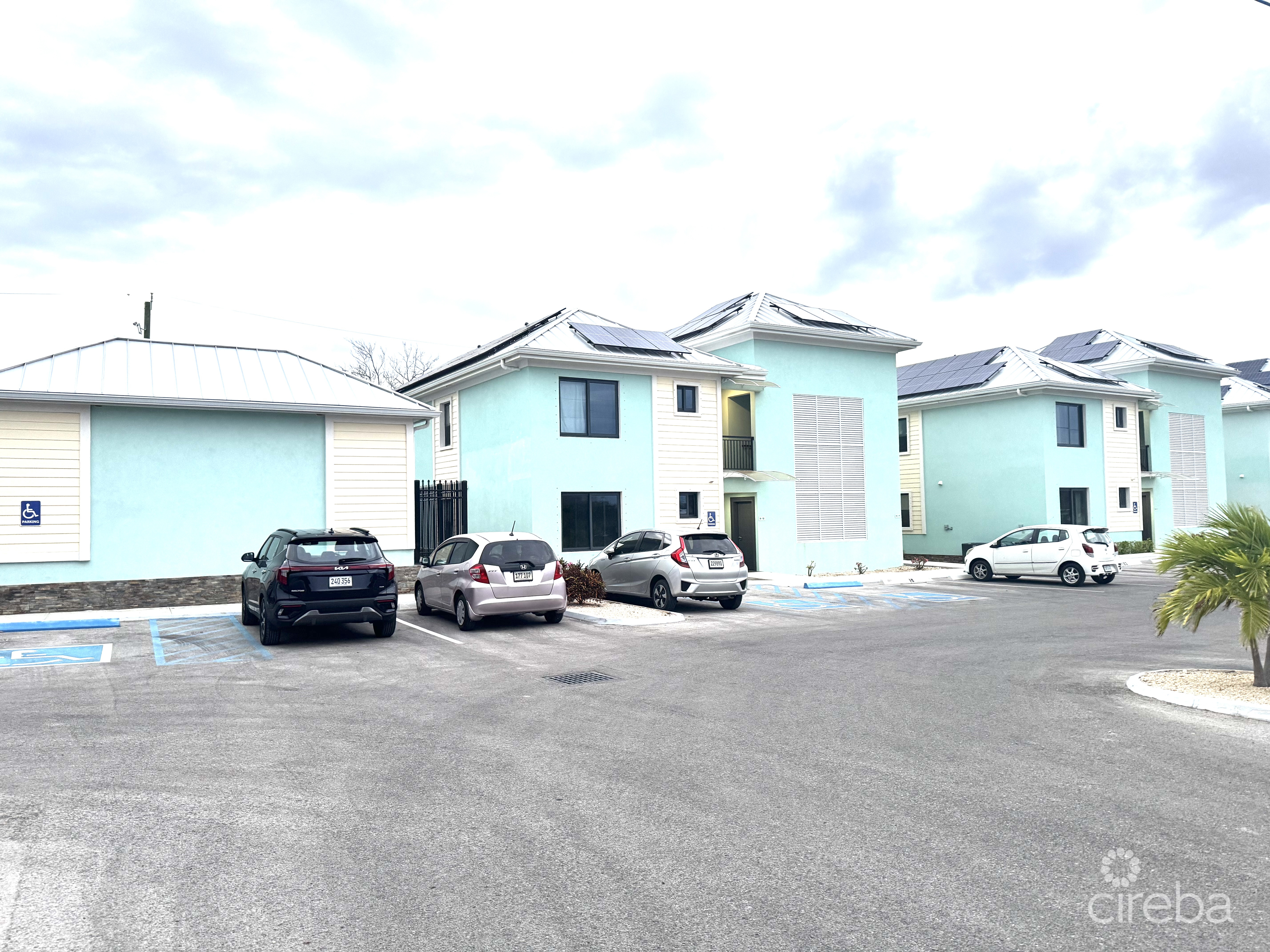 INCOME-PRODUCING RESIDENTIAL PORTFOLIO –4 STUDIOS IN WEST BAY